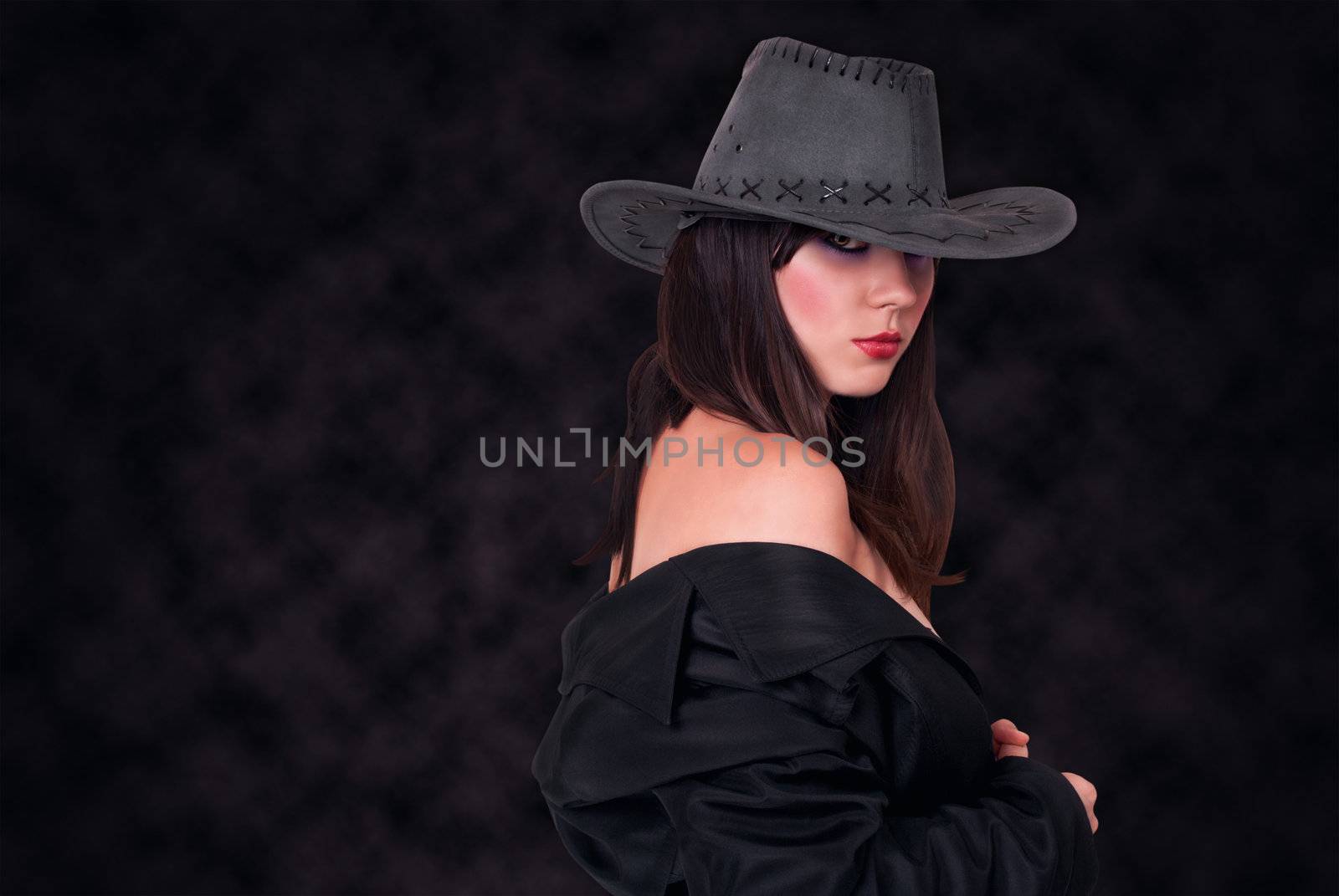 Sexy beautiful and fashionable woman in a hat.