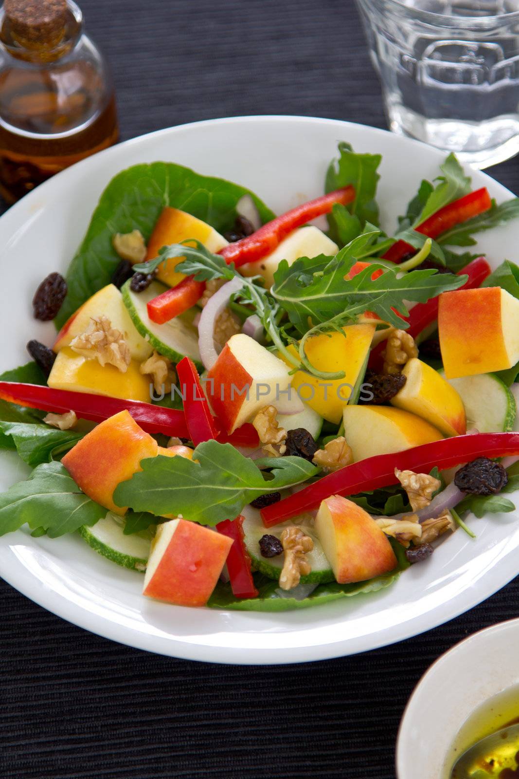 Apple,walnut,raisin and rocket salad by balsamic dressing