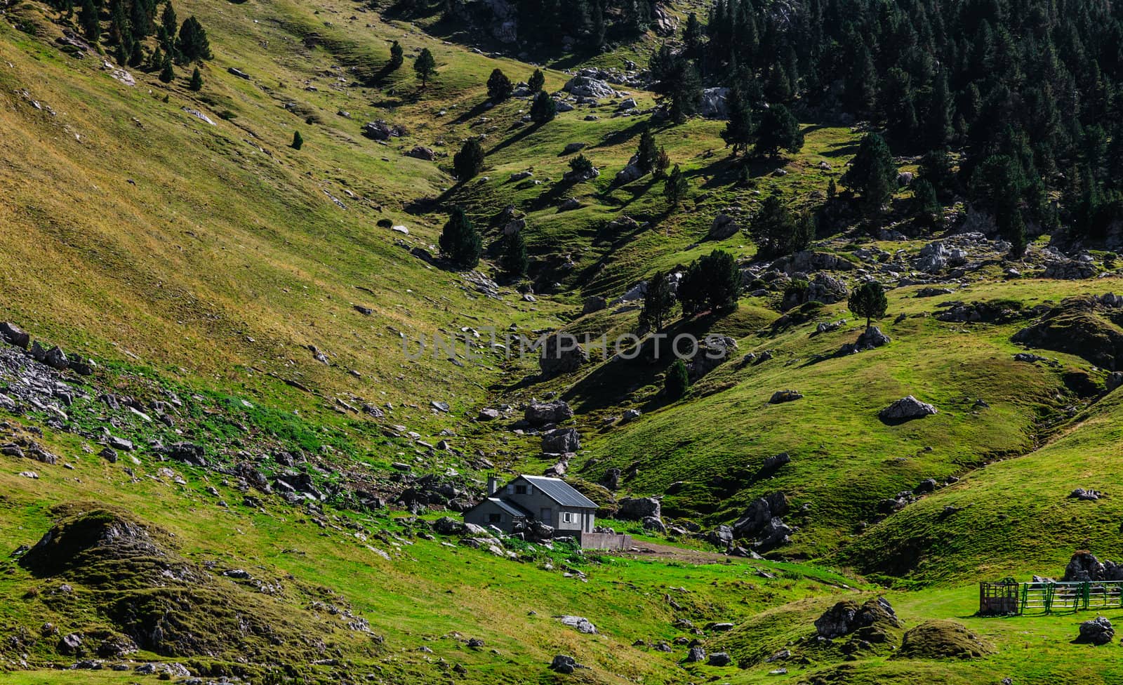 Image of a shelter located in a mountainous valley (Ossau Valley) in Pyrenees Mountains, France.