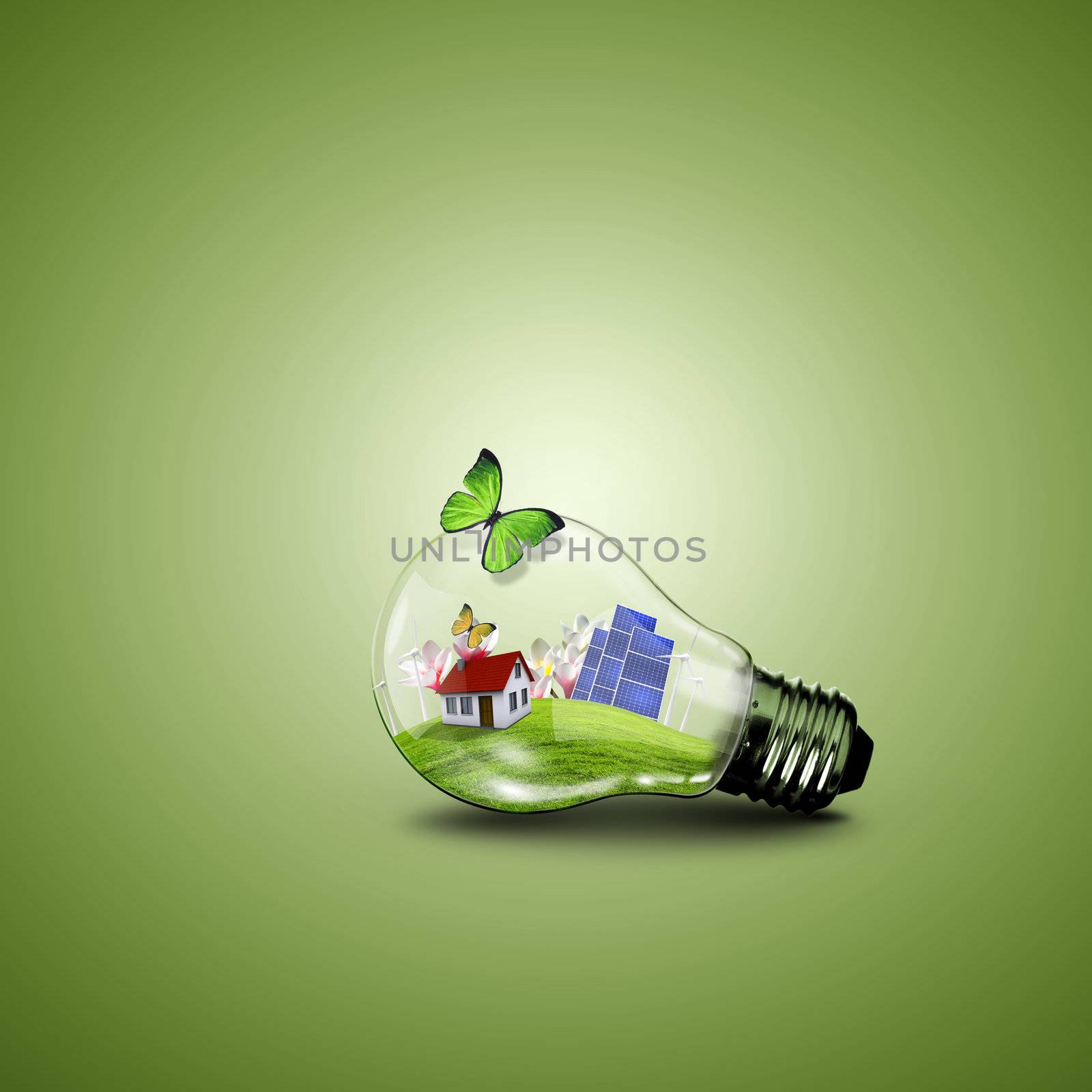 Electric light bulb and house inside it as symbol of green energy