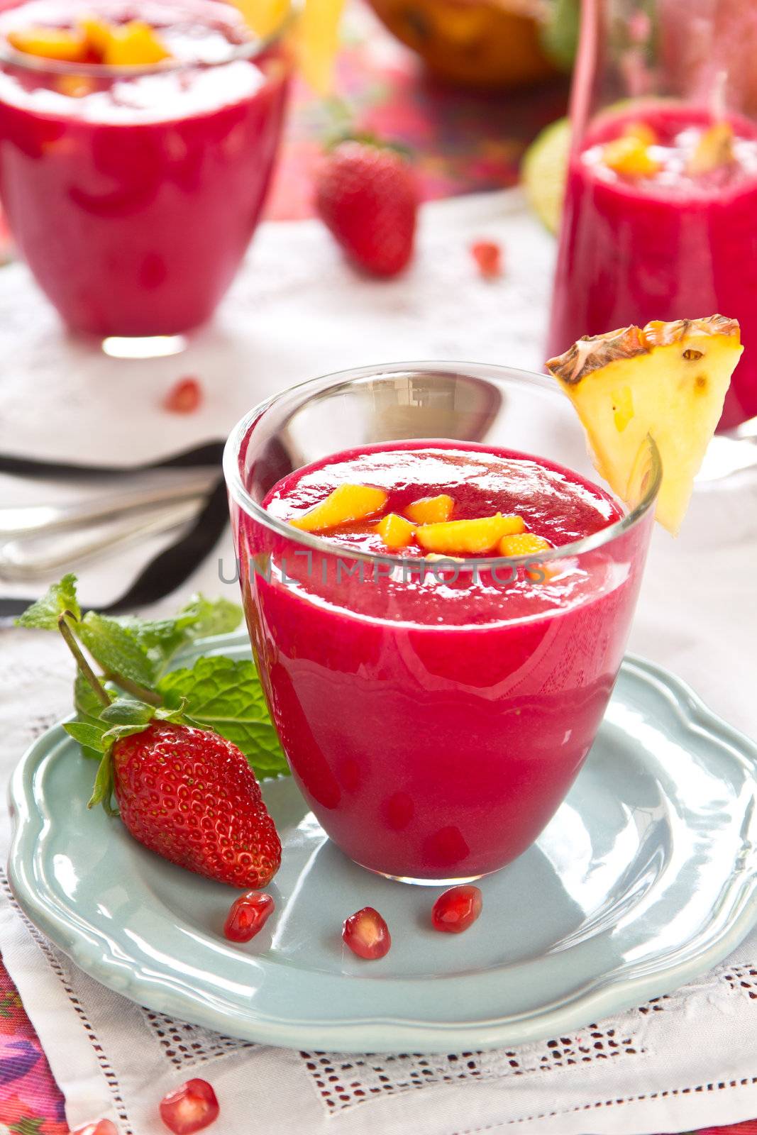 Beetroot,Mango,pineapple and pomegranate smoothie with mint