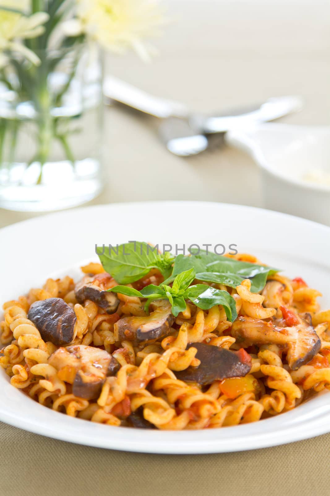 Fusili with mushroom in tomato sauce