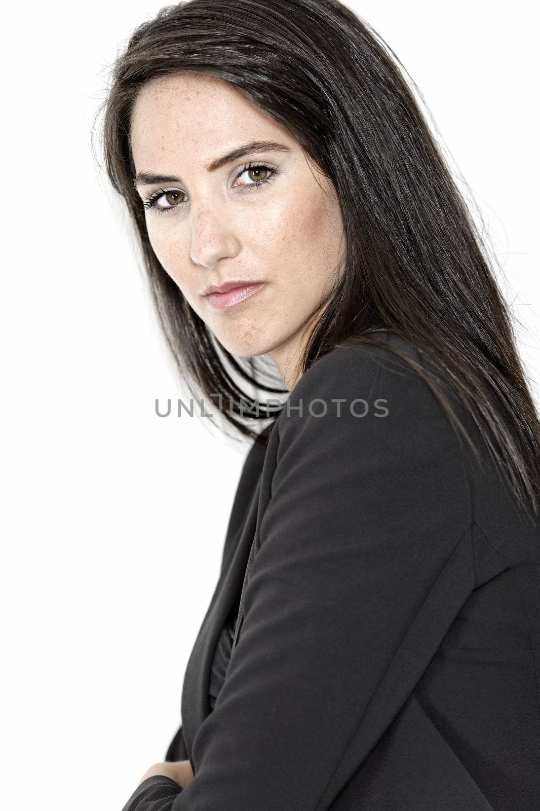 Professional working woman in corporate business clothes with a serious look