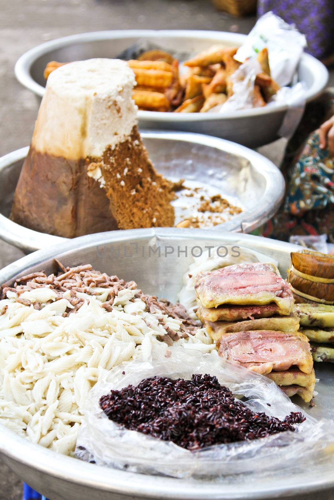 Varieties of Burmese 's dessert sell on a street in a market ,Yangom,Burma