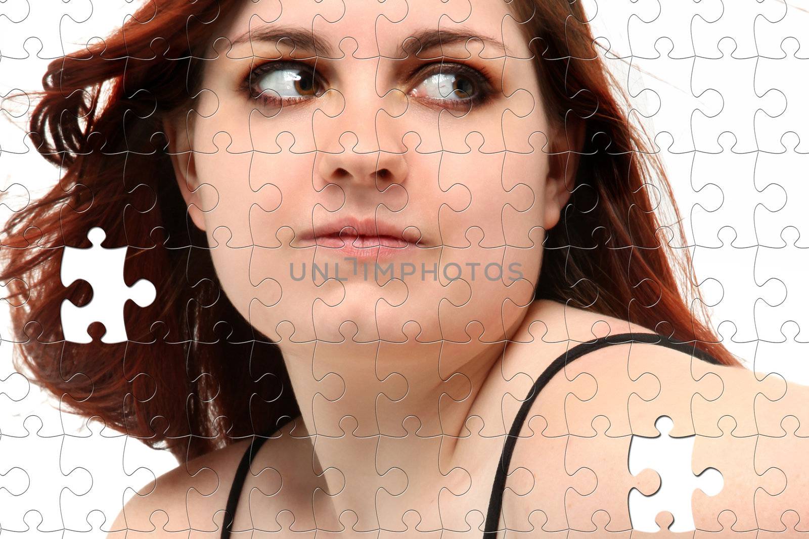 Teen girl in prom dress puzzle over white.