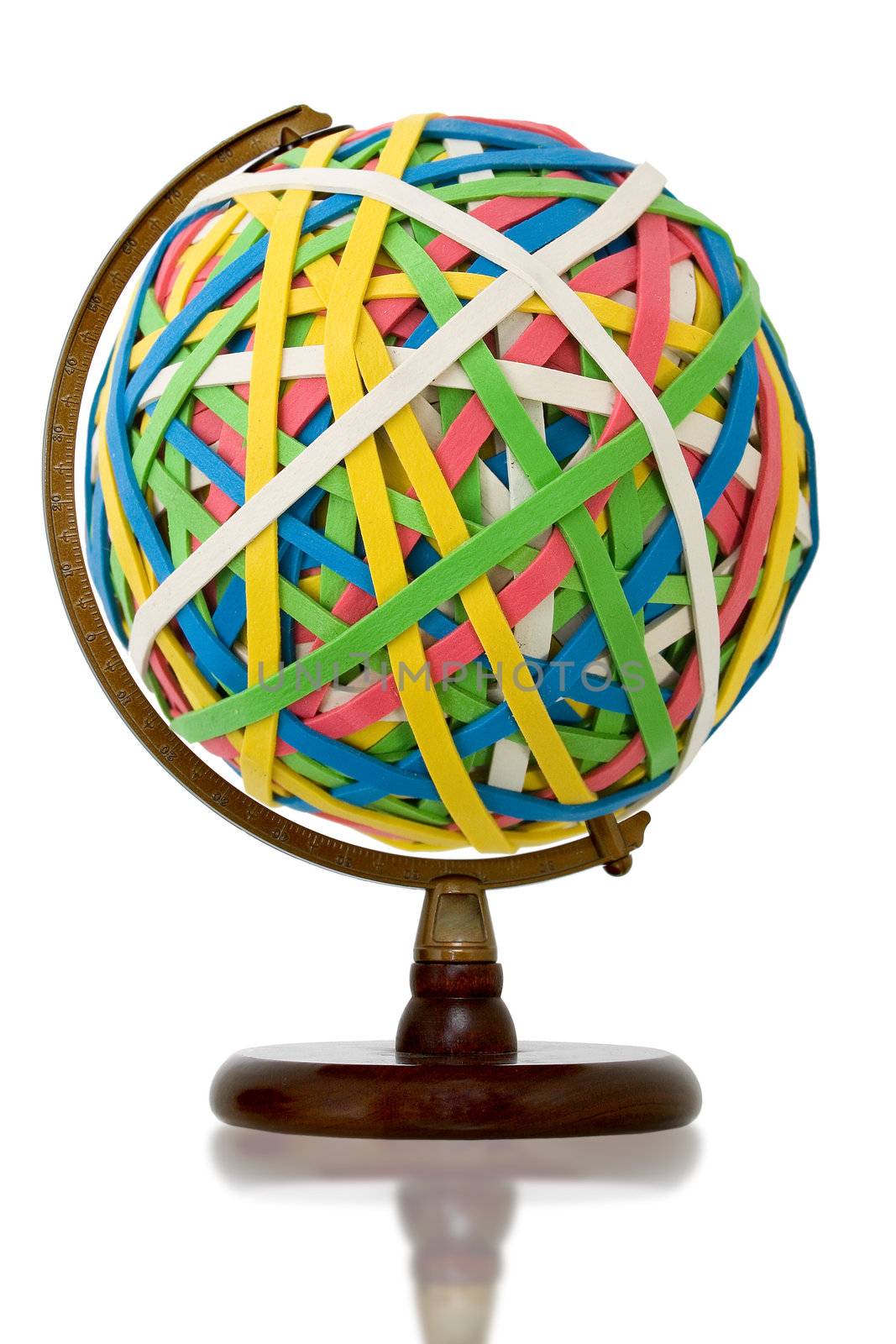 Huge rubber band ball held on wooden globe stand.
