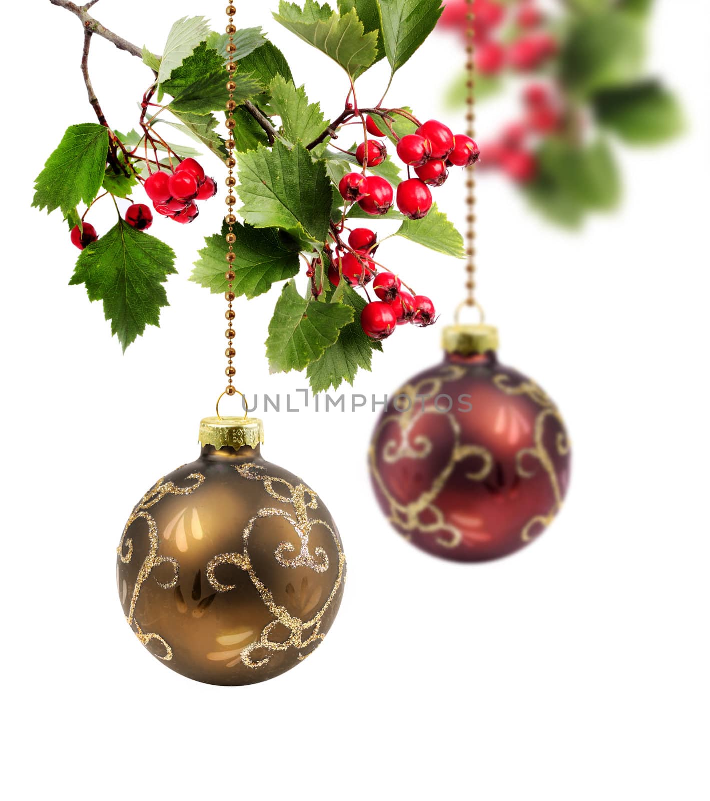 Red and golden Christmas balls with hawthorn berries branch, isolated on white