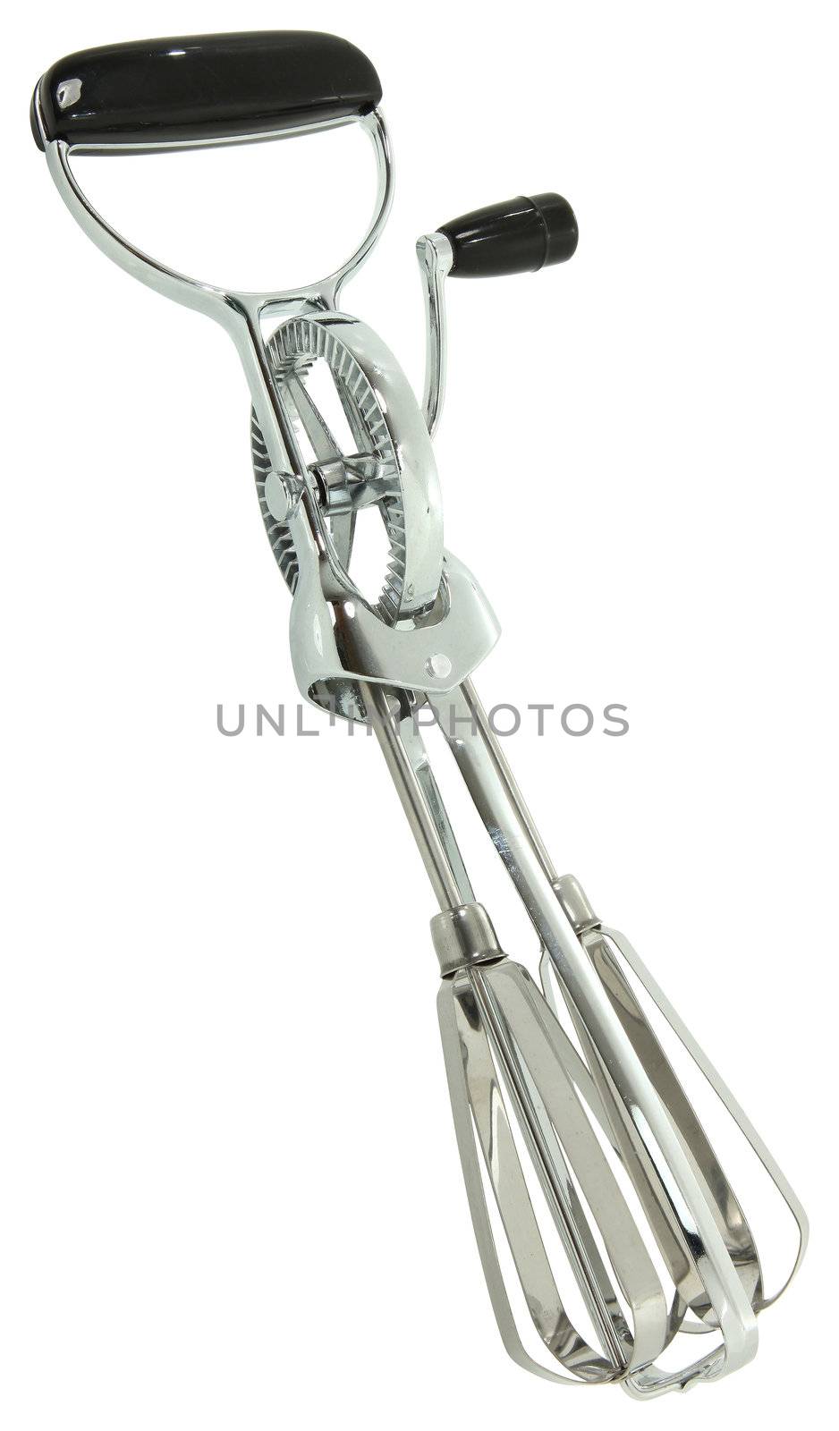 close up manual hand crank egg beater over white