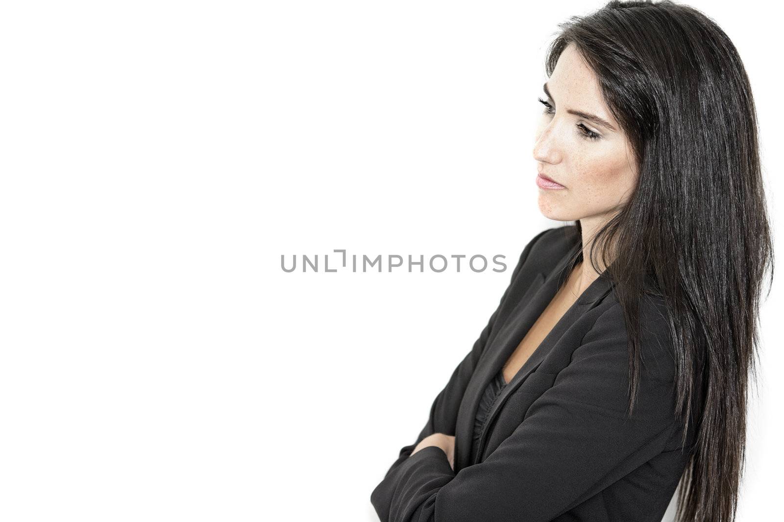 Professional working woman in corporate business clothes with a serious look