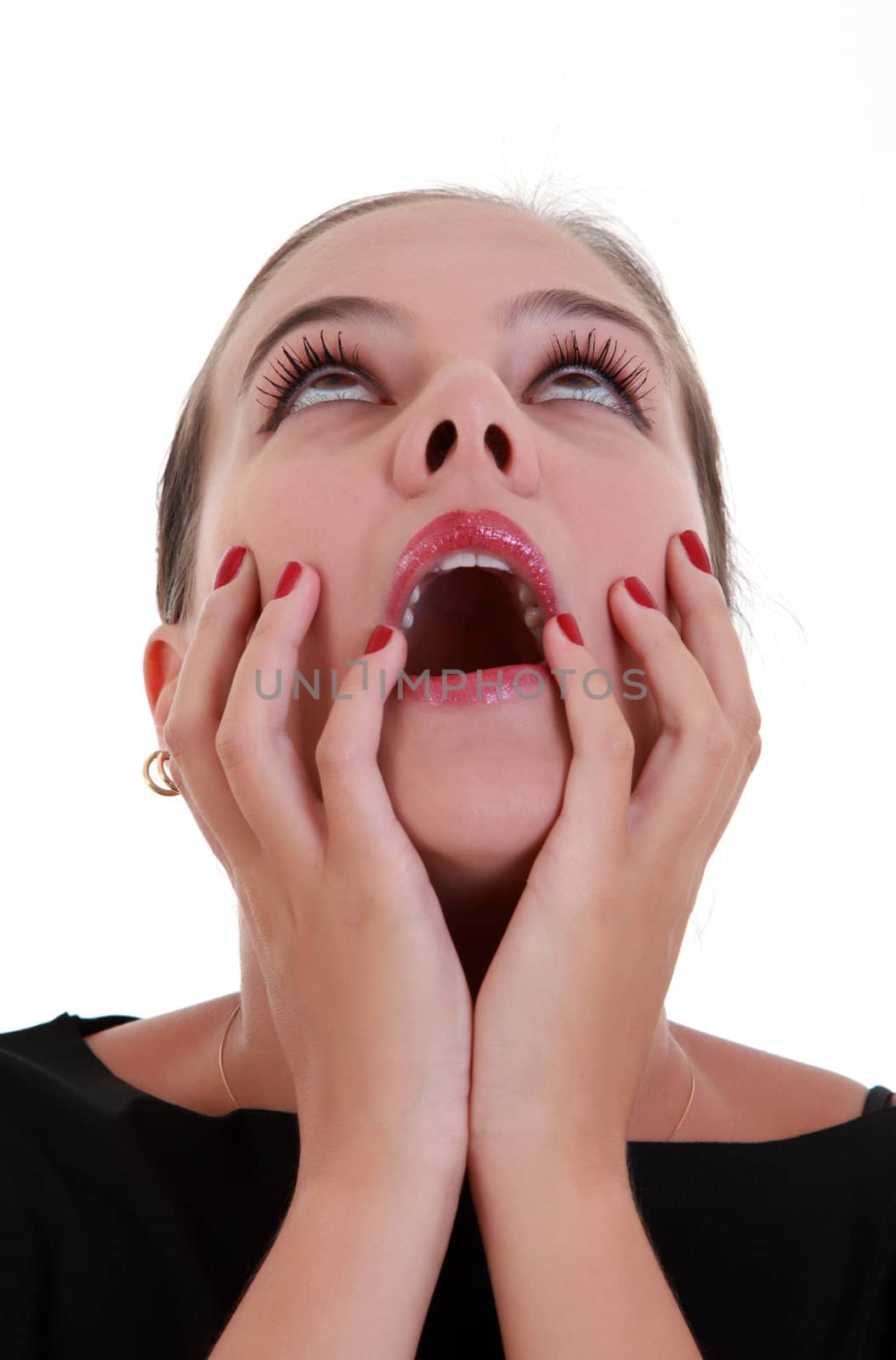 Portrait of afraid screaming young woman