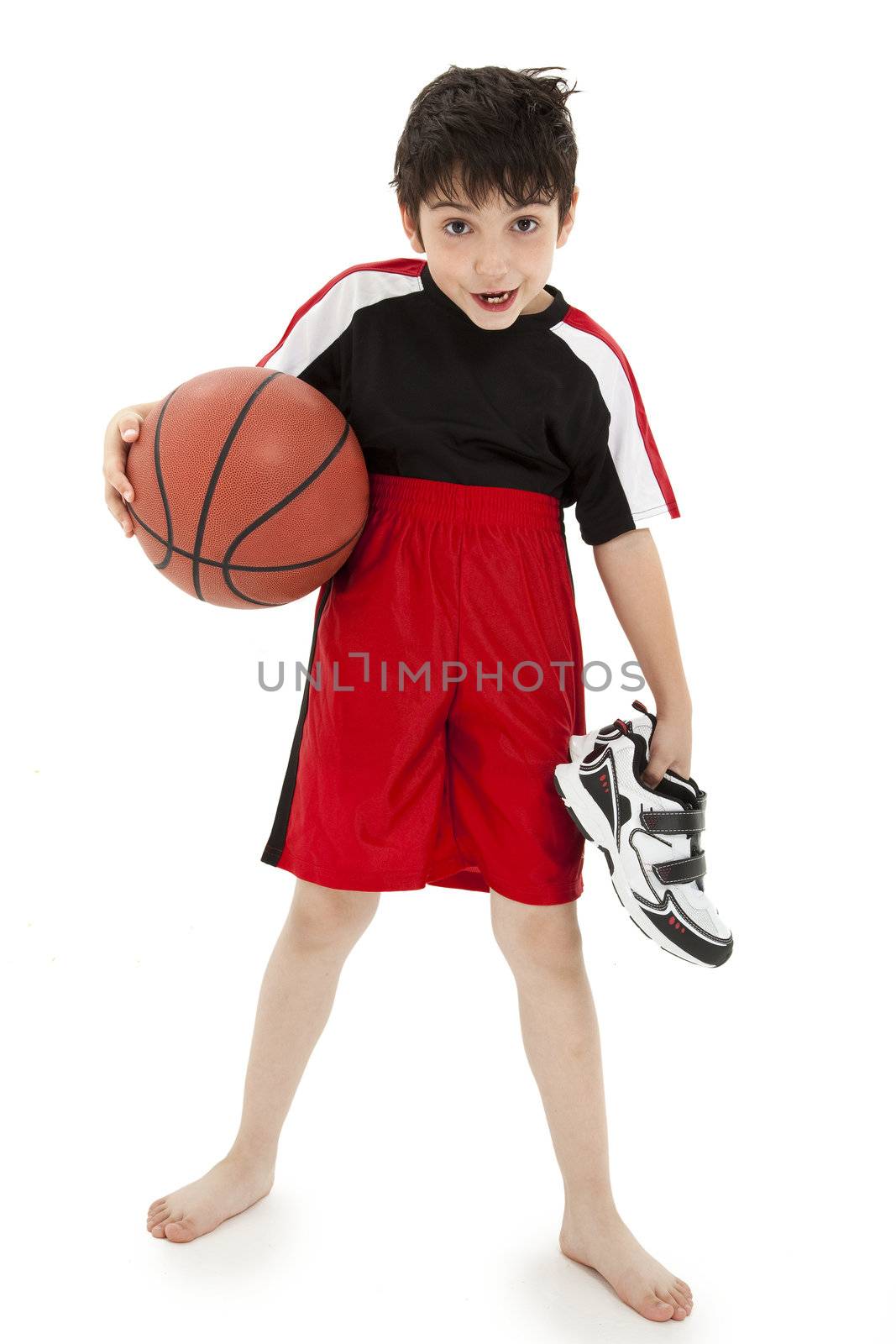 Boy child basketball playiing nerd with ball over white background.