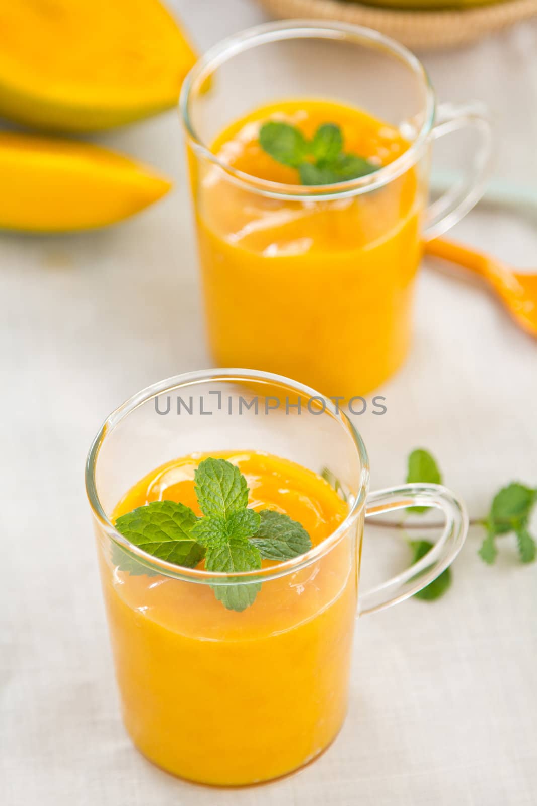 Mango smoothie with mint by some fresh mango
