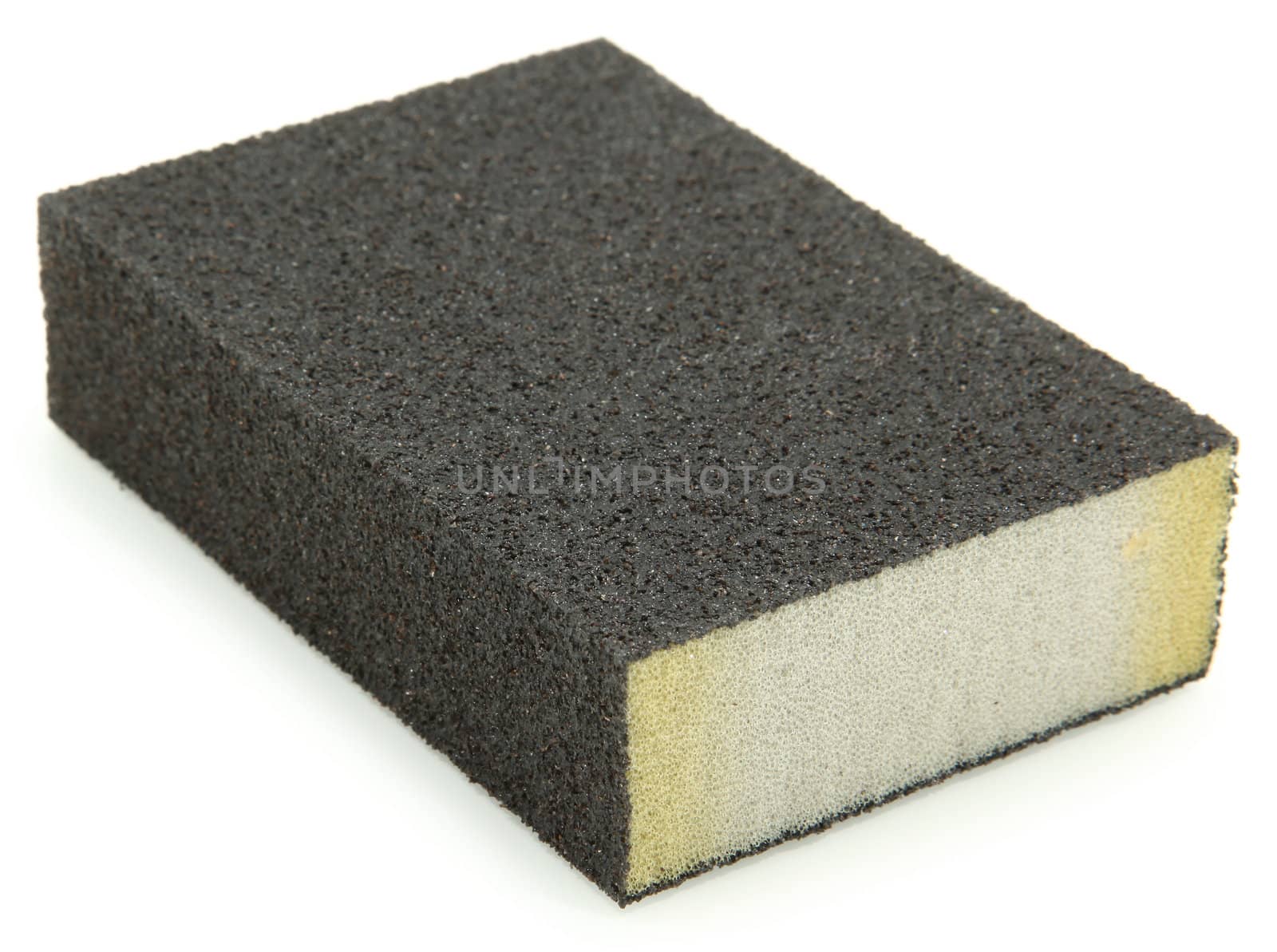 Isolated sanding block sponge over white background.