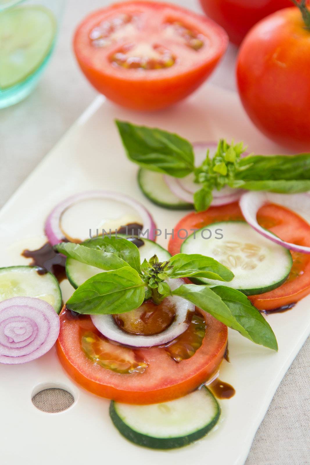 Tomato,cucumber and basil salad with balsamic sauce