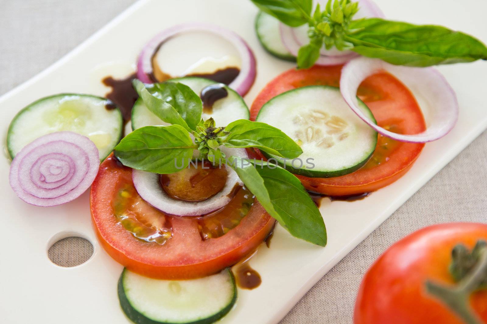 Tomato,cucumber and basil salad with balsamic sauce