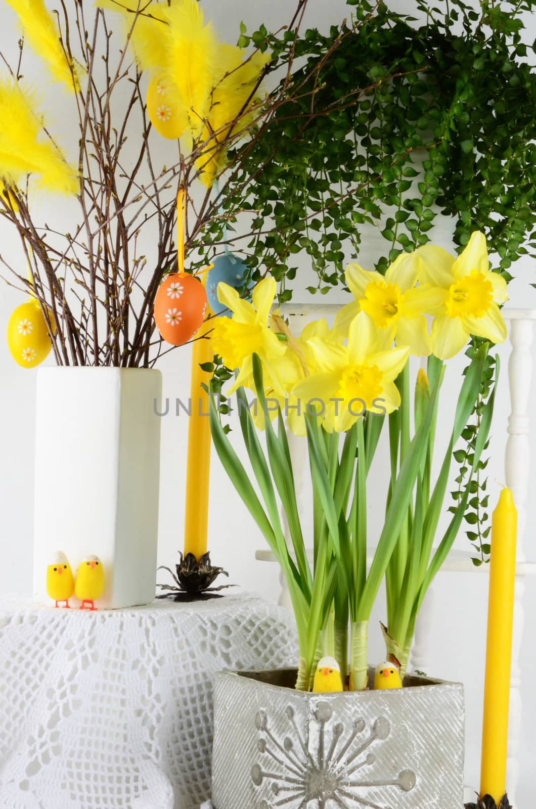 Easter lilies, Easter eggs, feathers and other decorations for Easter