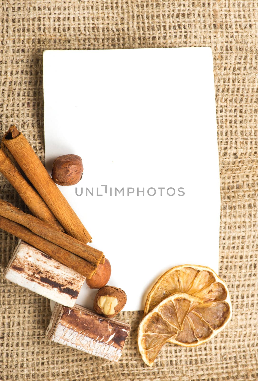 Menu Design.Old paper, coffee bean, cinnamon, lemon, burlap.