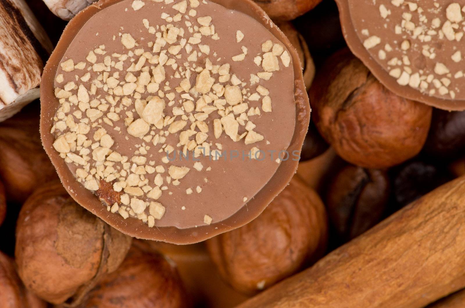 Closeup of coffee beans, cinnamon and nuts