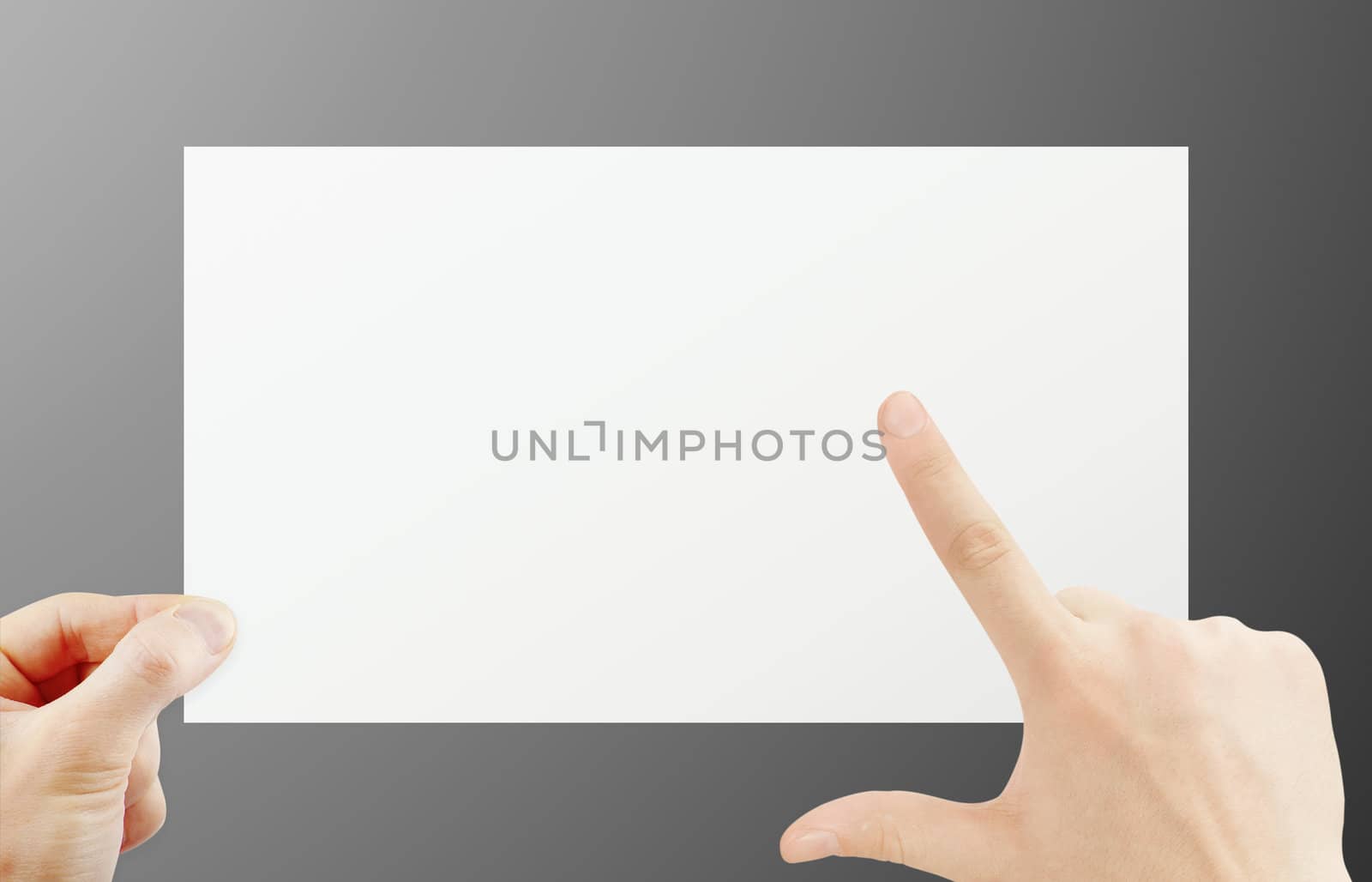 Hand holding paper