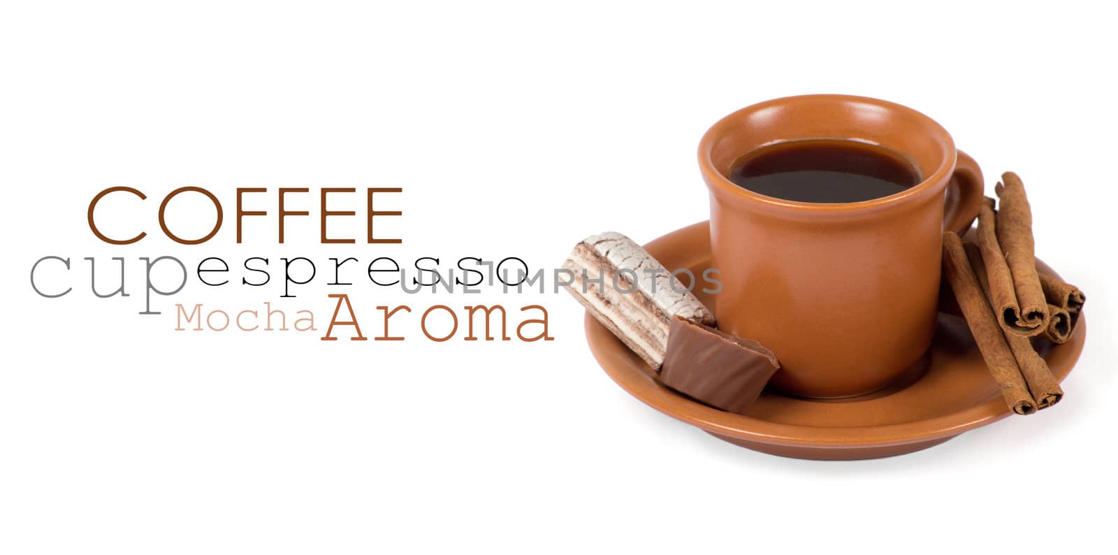Closeup shot of freshly prepared cup of italian espresso with cinnamon and candy over white background