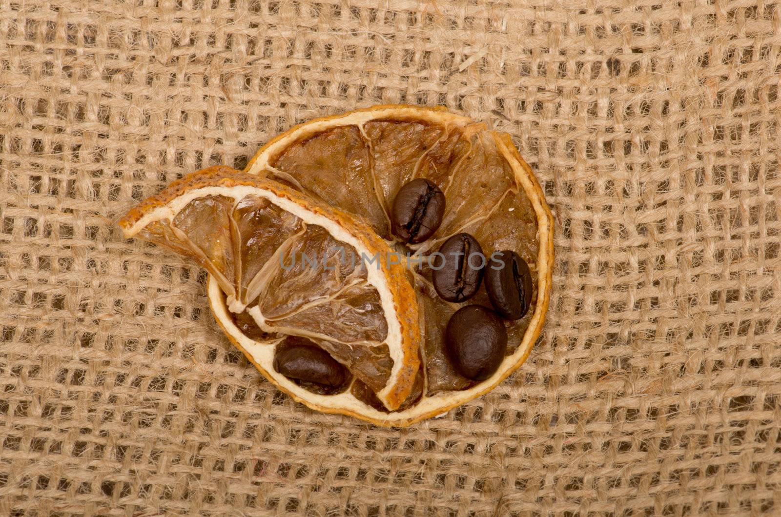 lemons and coffee beans on burlap