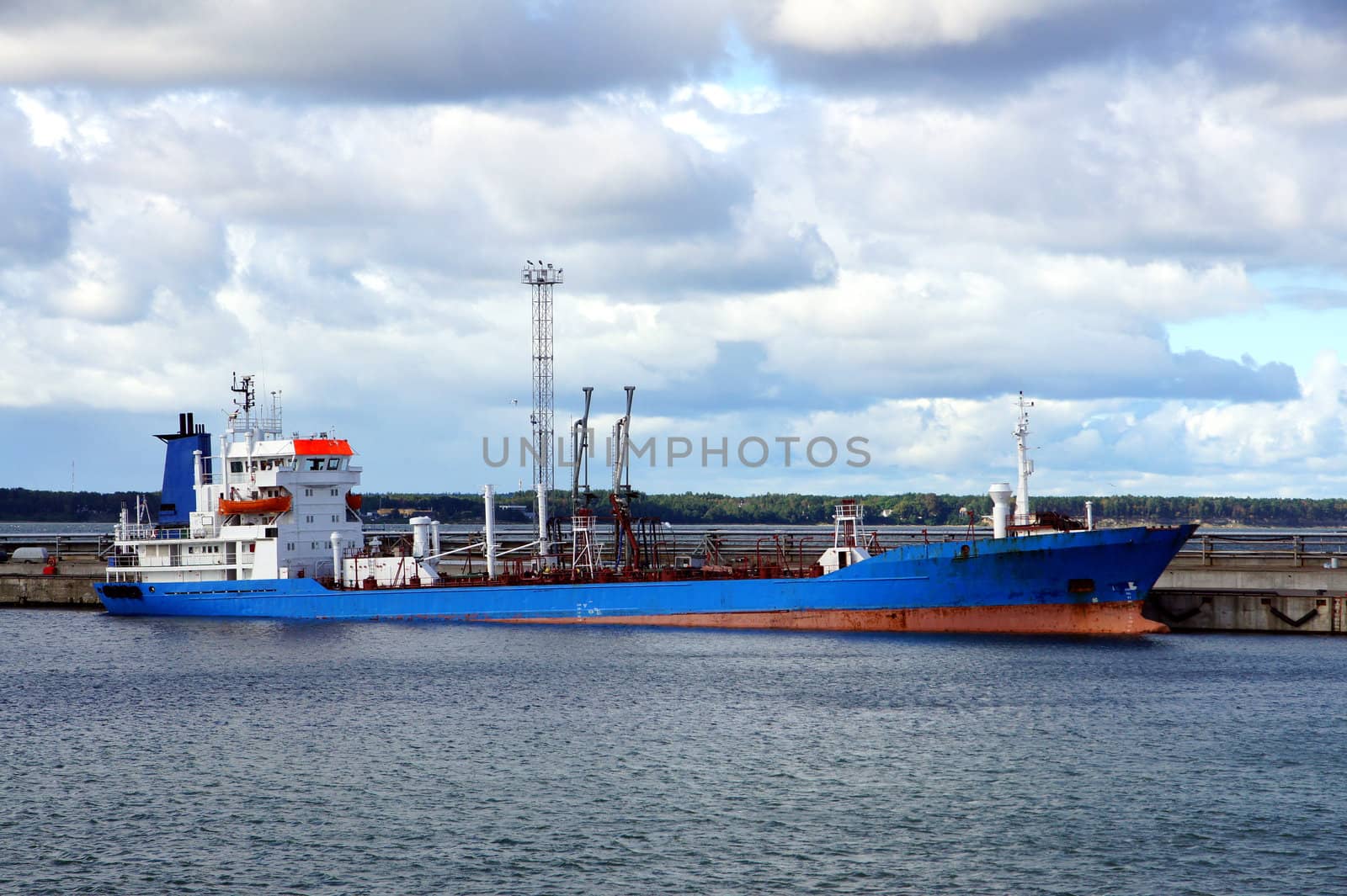 The tanker is moored in the port 