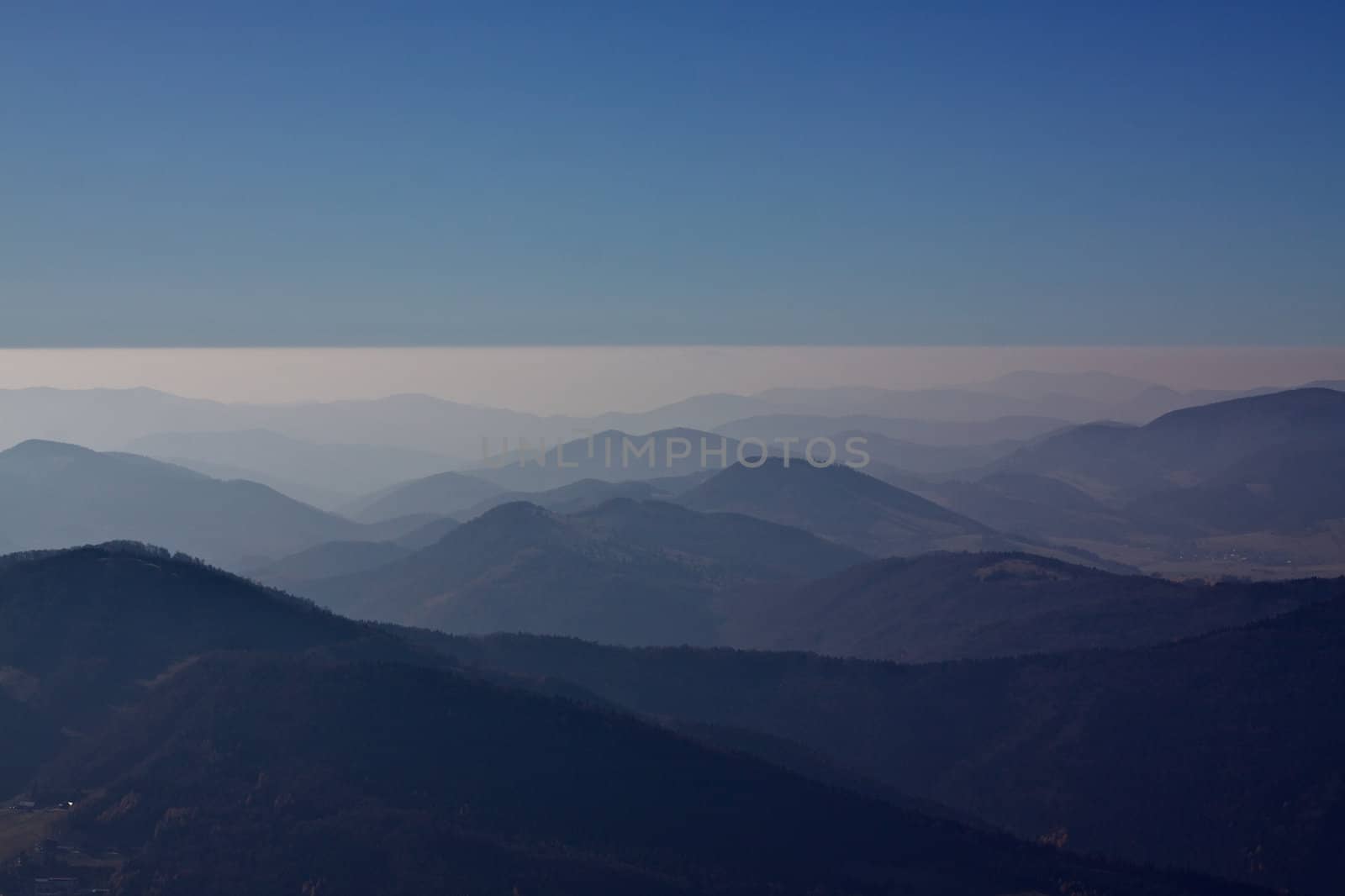 Aerial view of misty mountains of Fatra in Slovakia