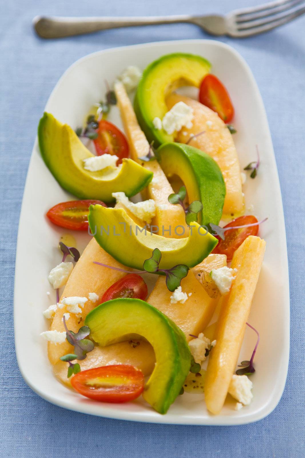 Avocado with Cantaloupe and Feta cheese salad by vinaigrette