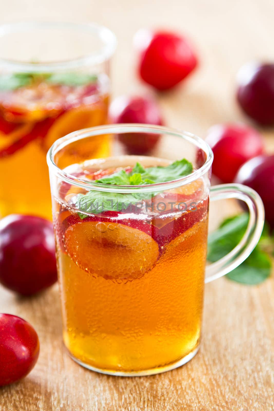 Plum juice with fresh plum and mint