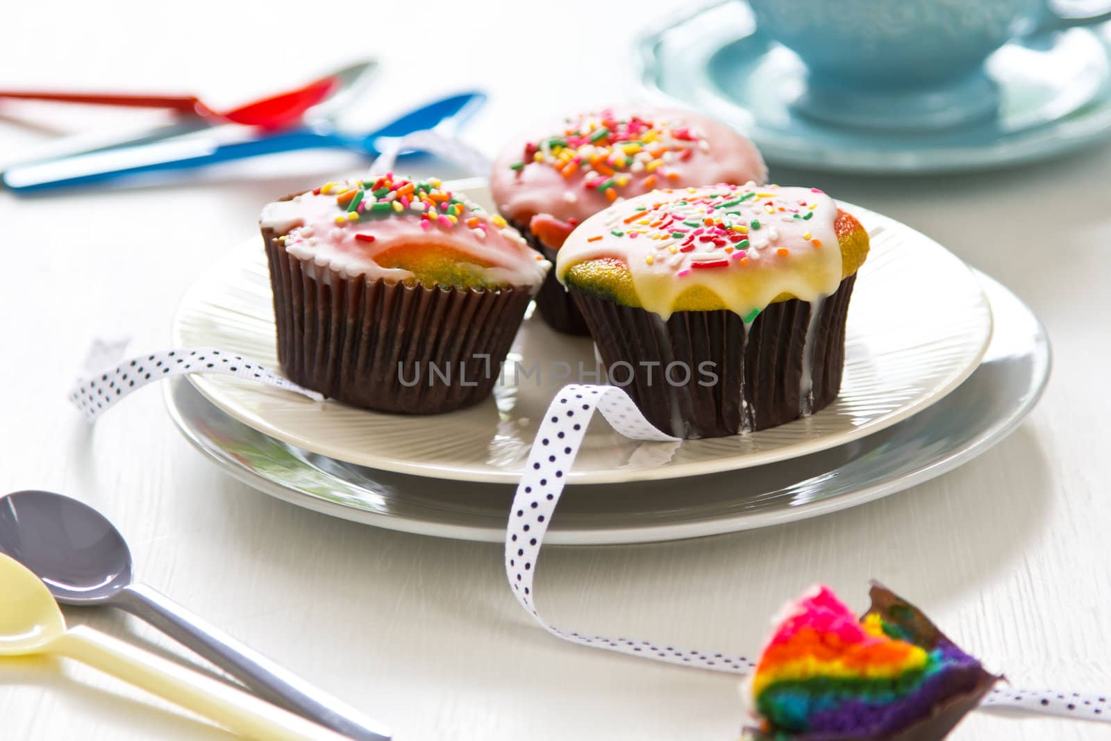 Colourful Rainbow cupcake with sugar on top