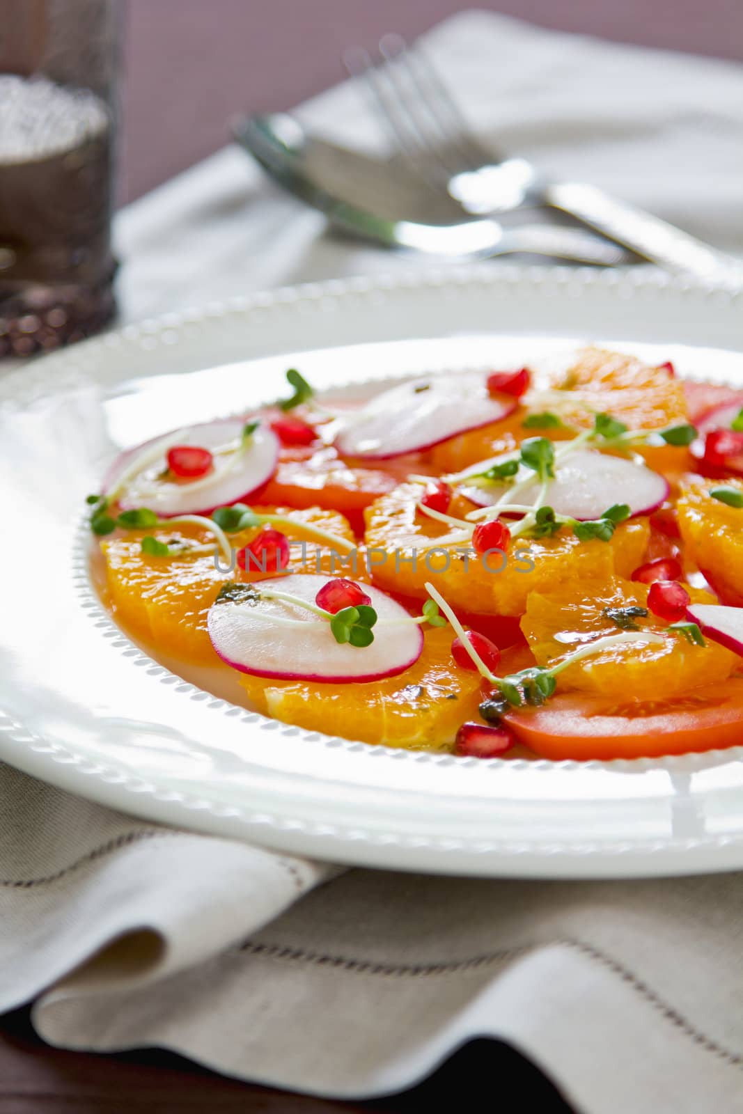Orange with tomato and pomegranate salad by vanillaechoes