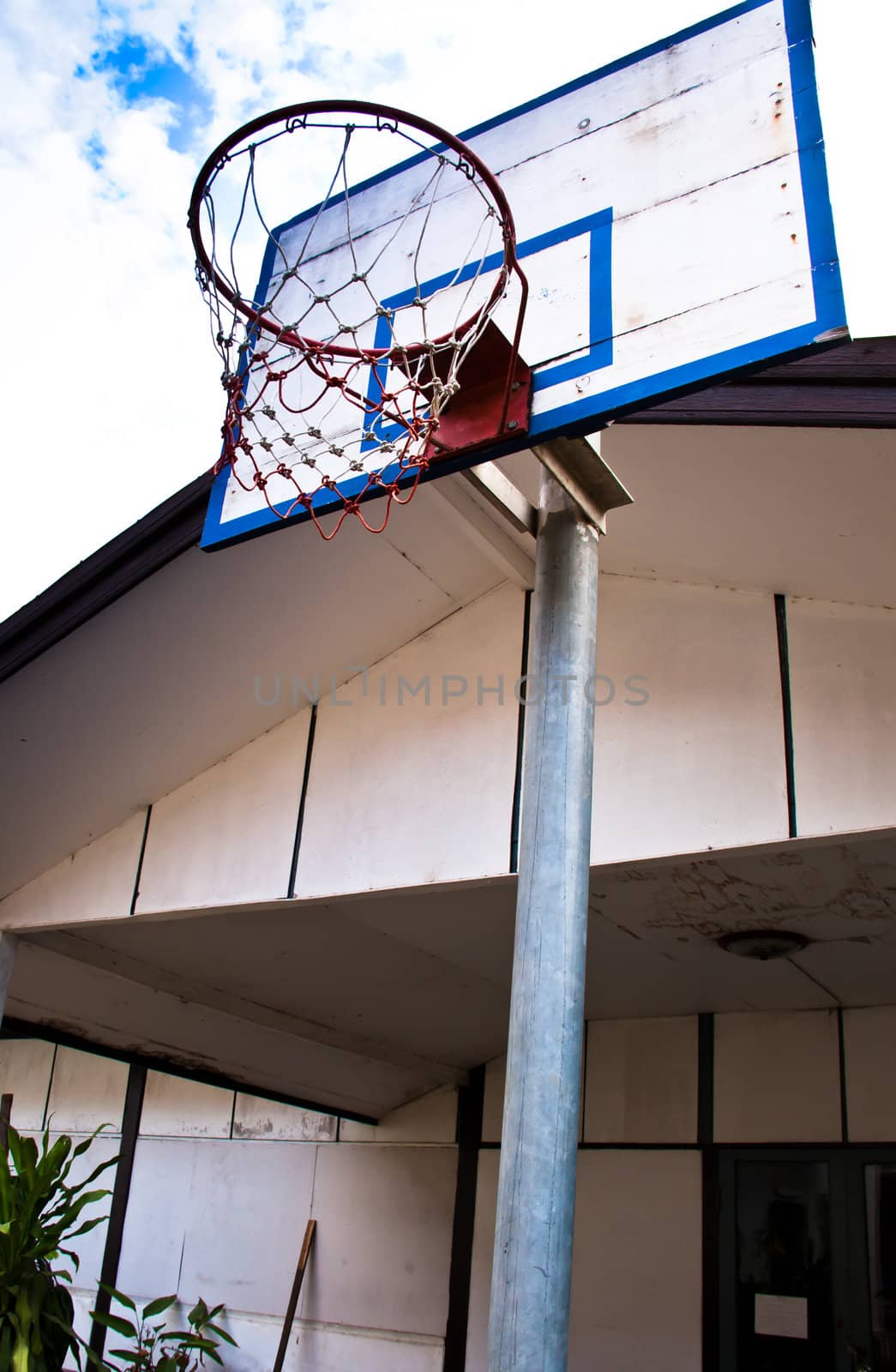 Basketball hoop at a high angle.