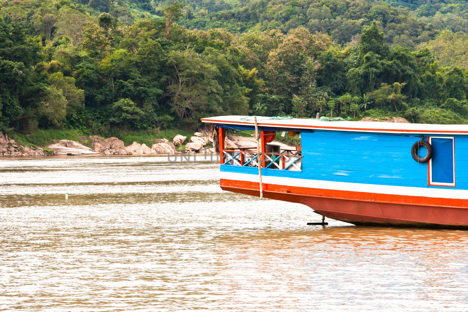 Boat sailing in the river to bring people in Laos country
