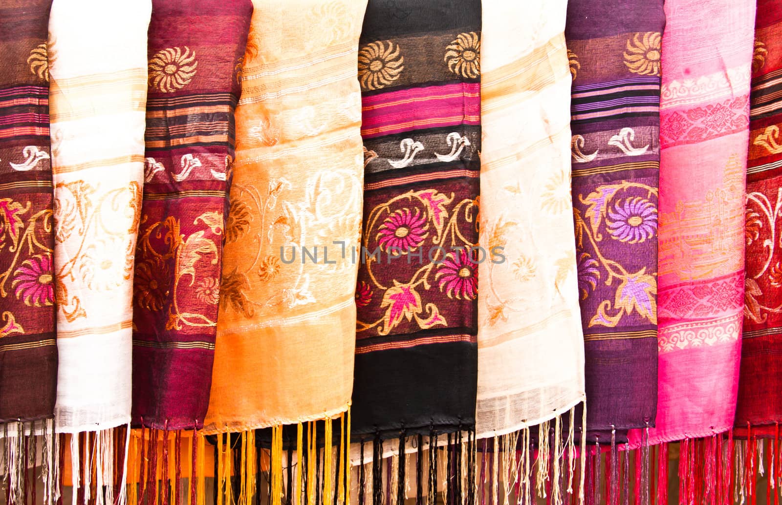 Multi-colored scarf. Was put into the background.