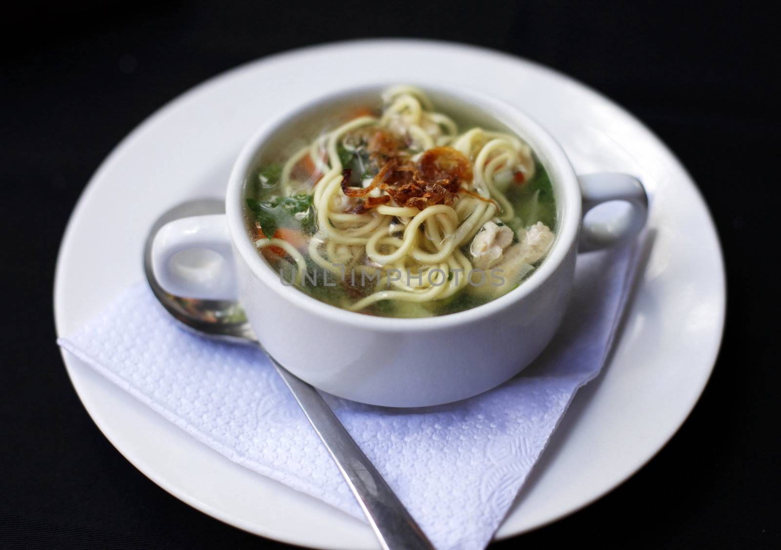 Popular comfort food of chicken noodle soup a favorite in Indonesia