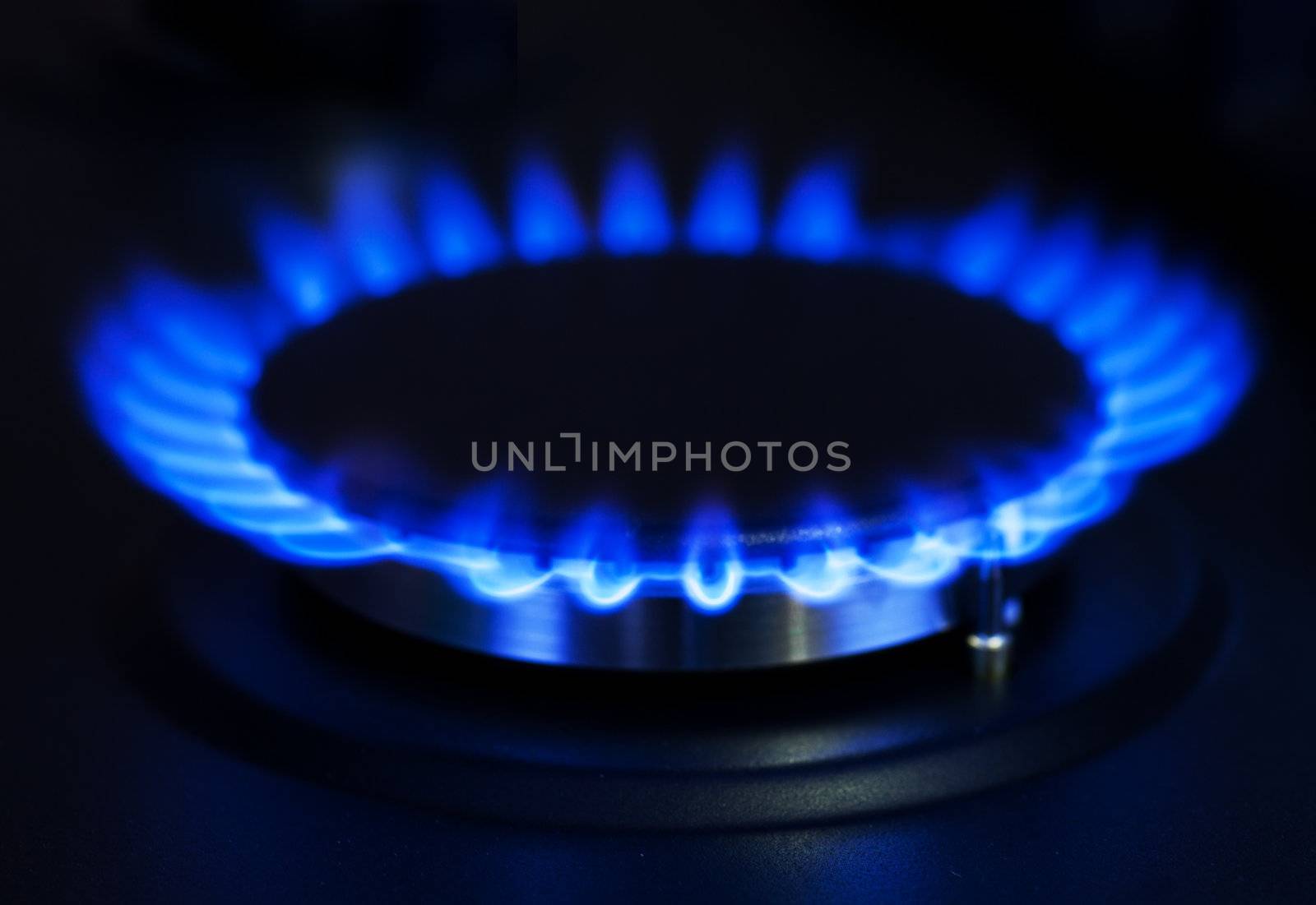 Blue gas stove in the dark