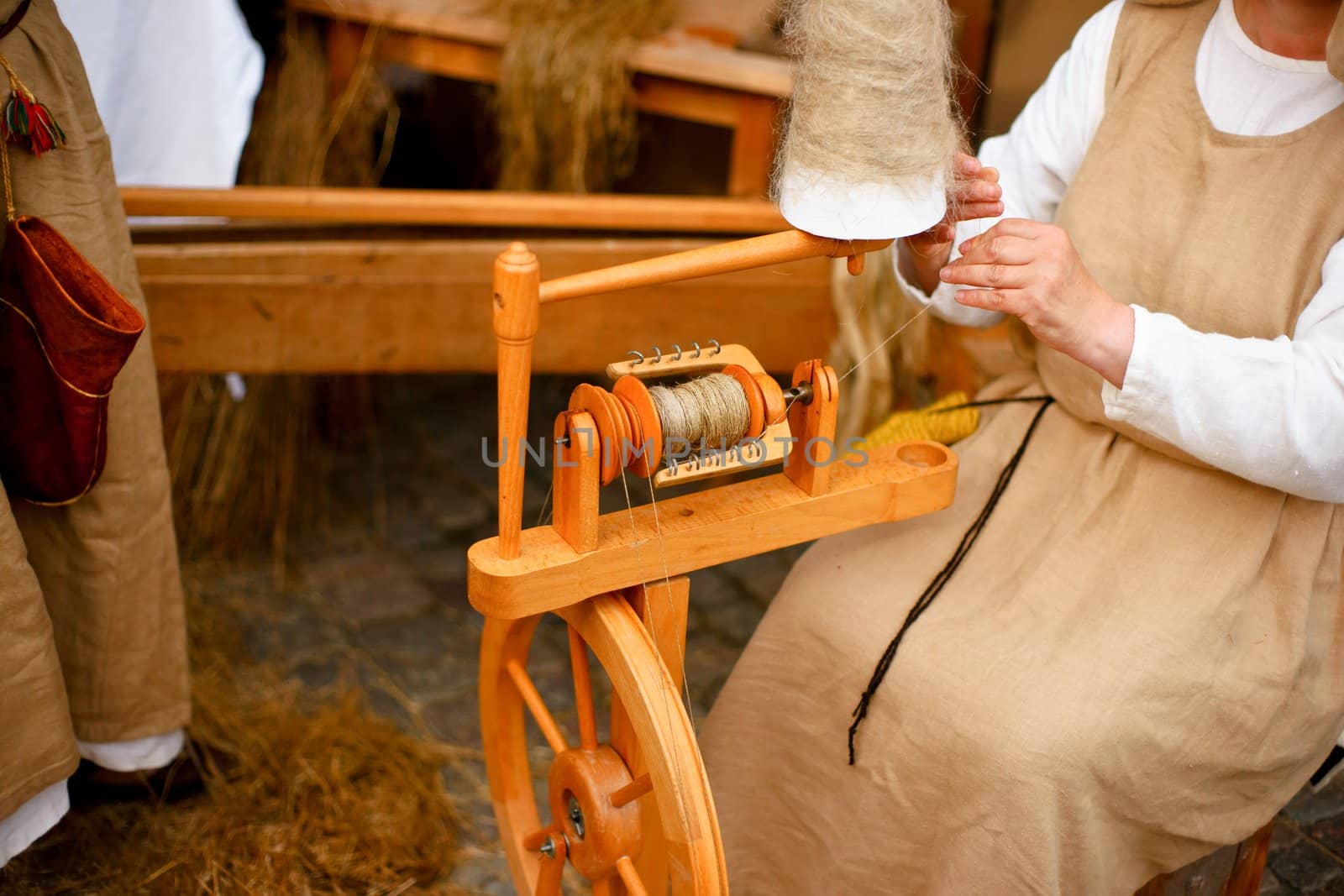 Woman working on an antique spindle







Antique spindle