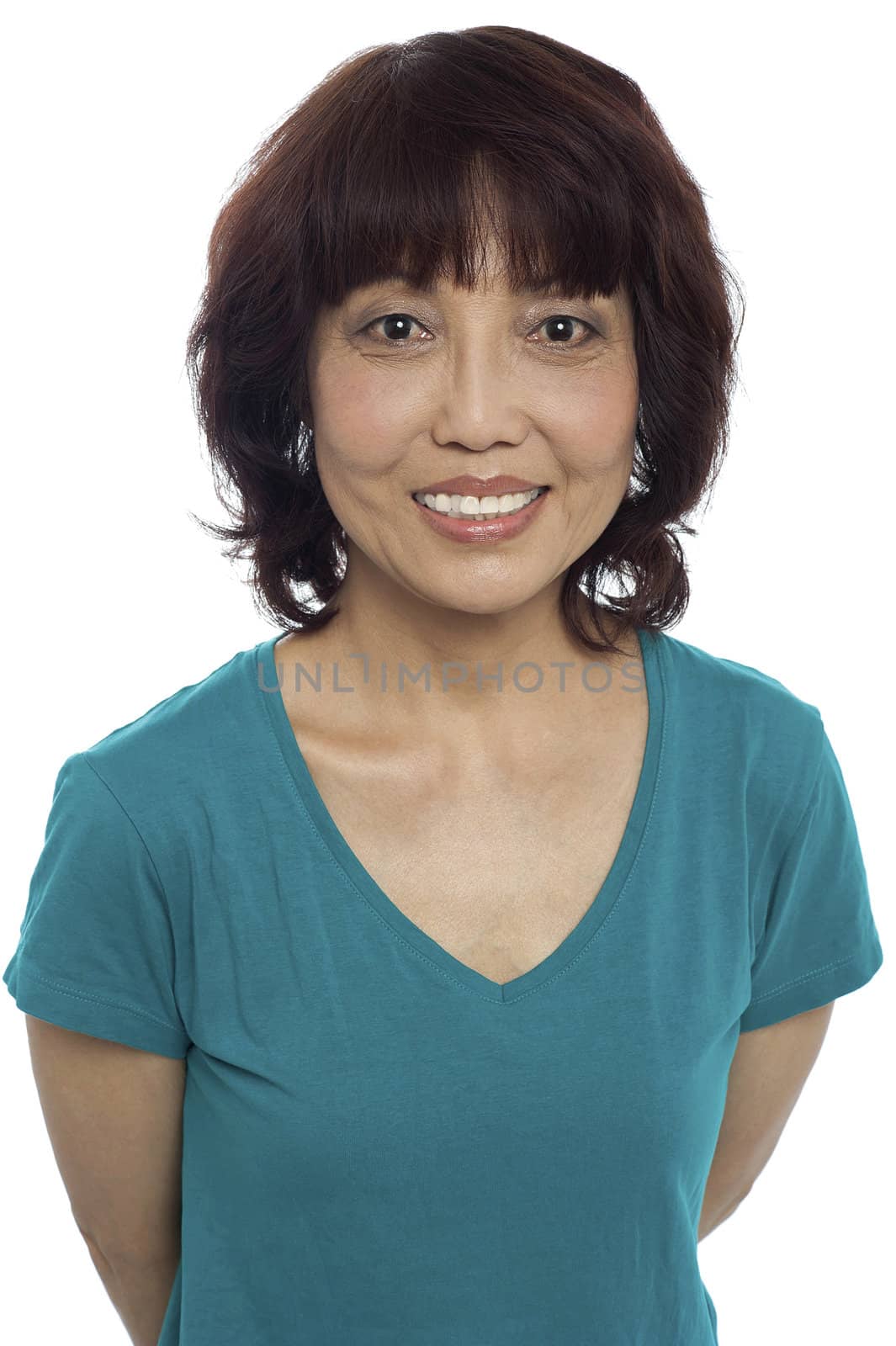 Picture of a smiling asian lady posing casually. Closeup shot