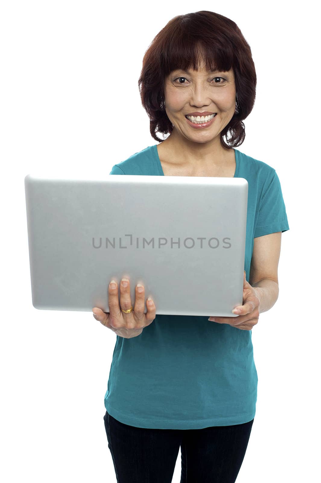Casual asian girl holding laptop isolated against white background