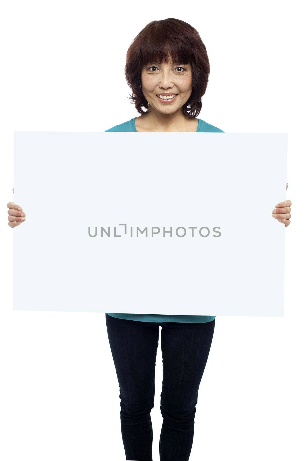 Woman holding billboard, your ad here. Isolated on white