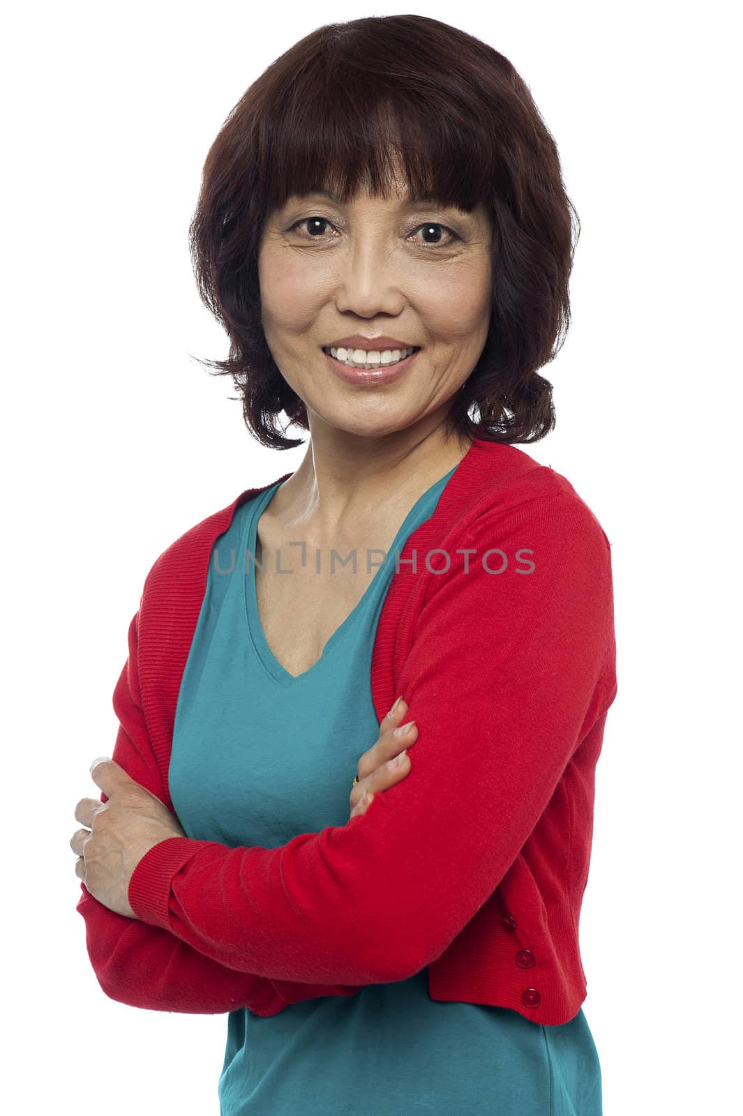 Asian woman posing with her arms crossed isolated against white background