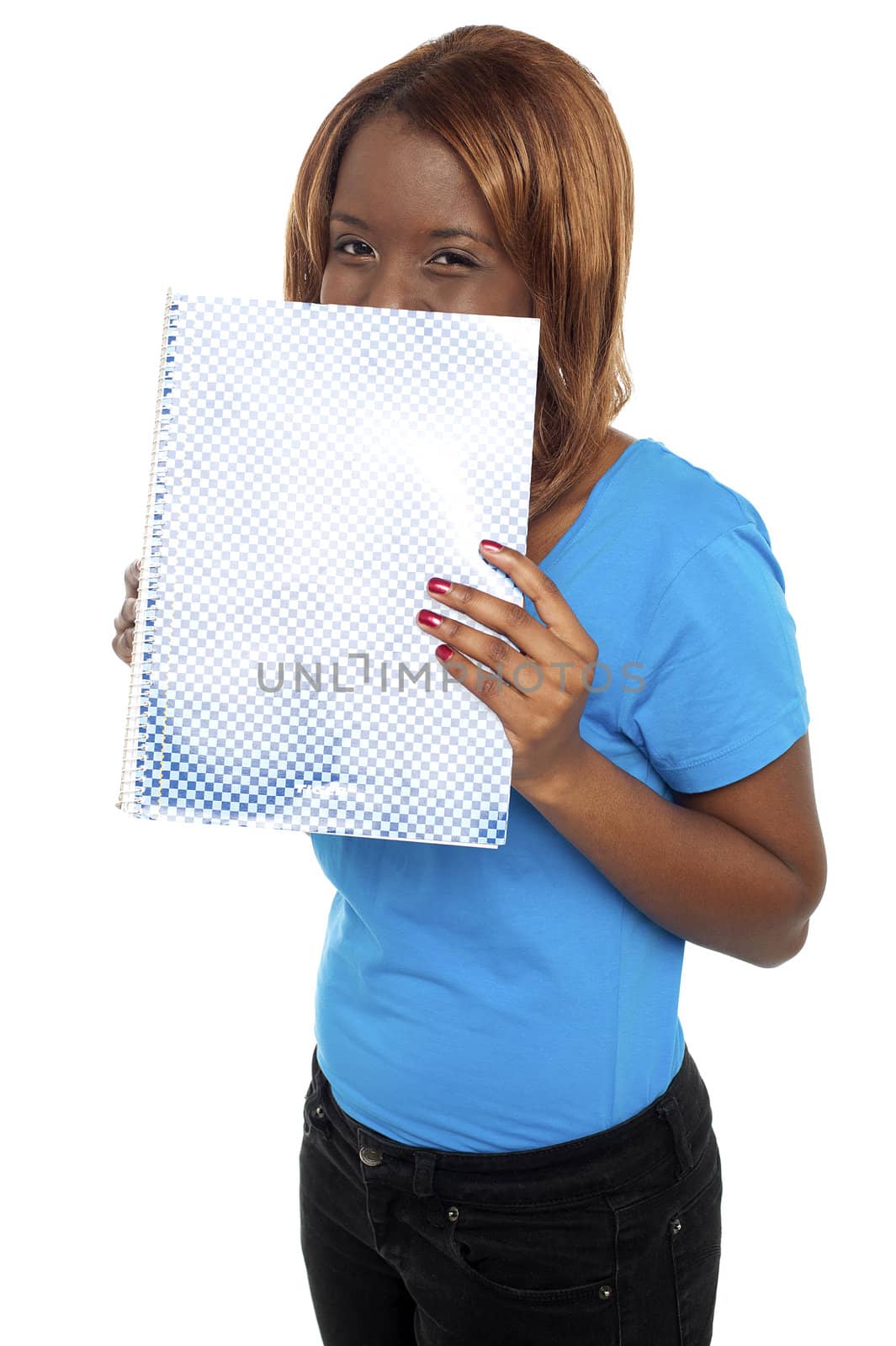 Pretty girl hiding her face through notebook. Casual young college student