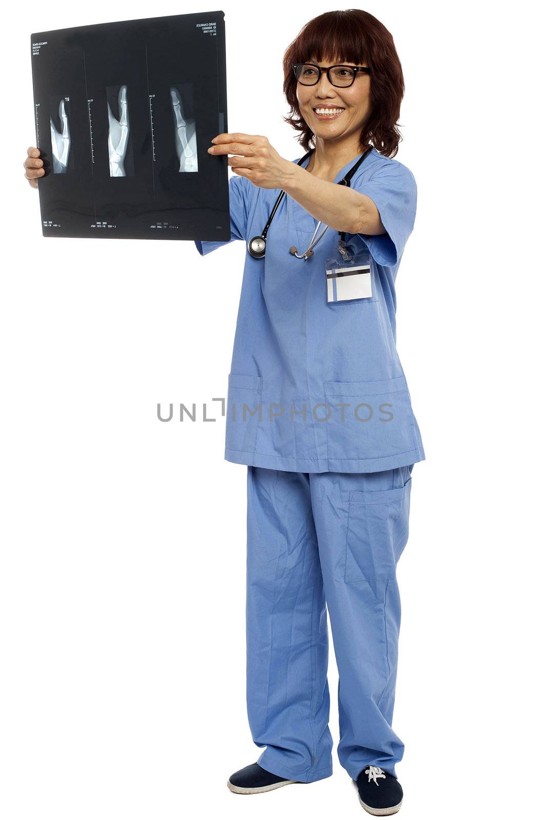 Full length portrait of asian nurse holding x-ray report of patient