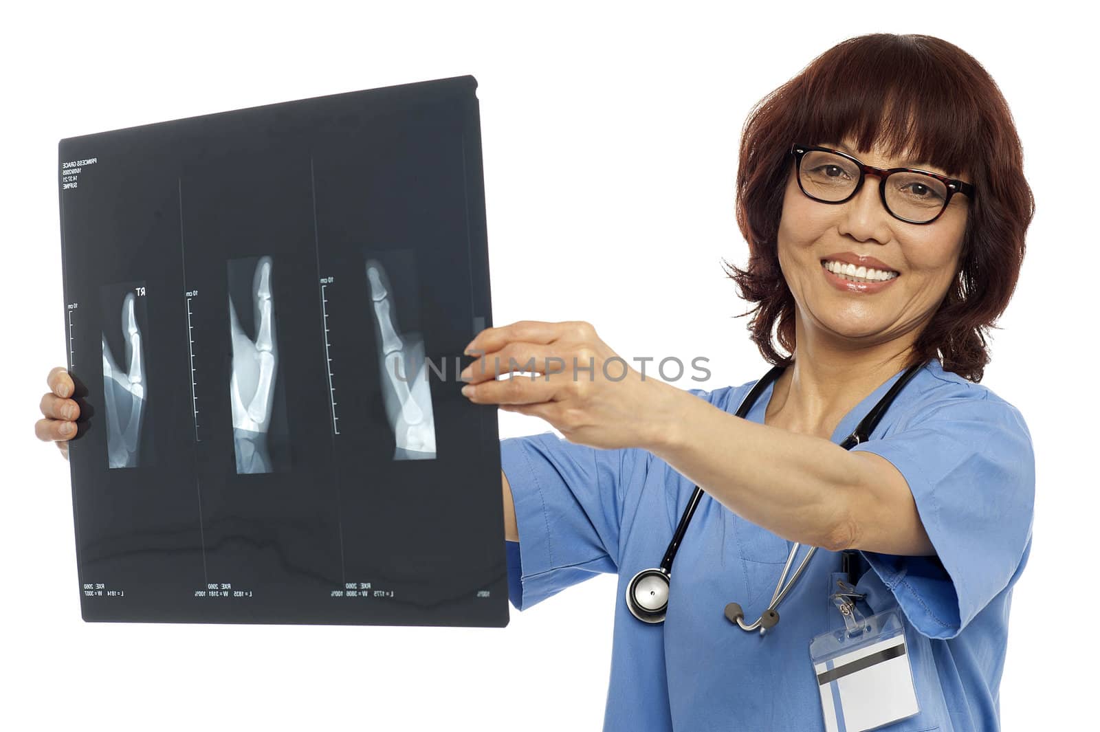 Doctor holding x-ray report. Analyzing it. All on white background