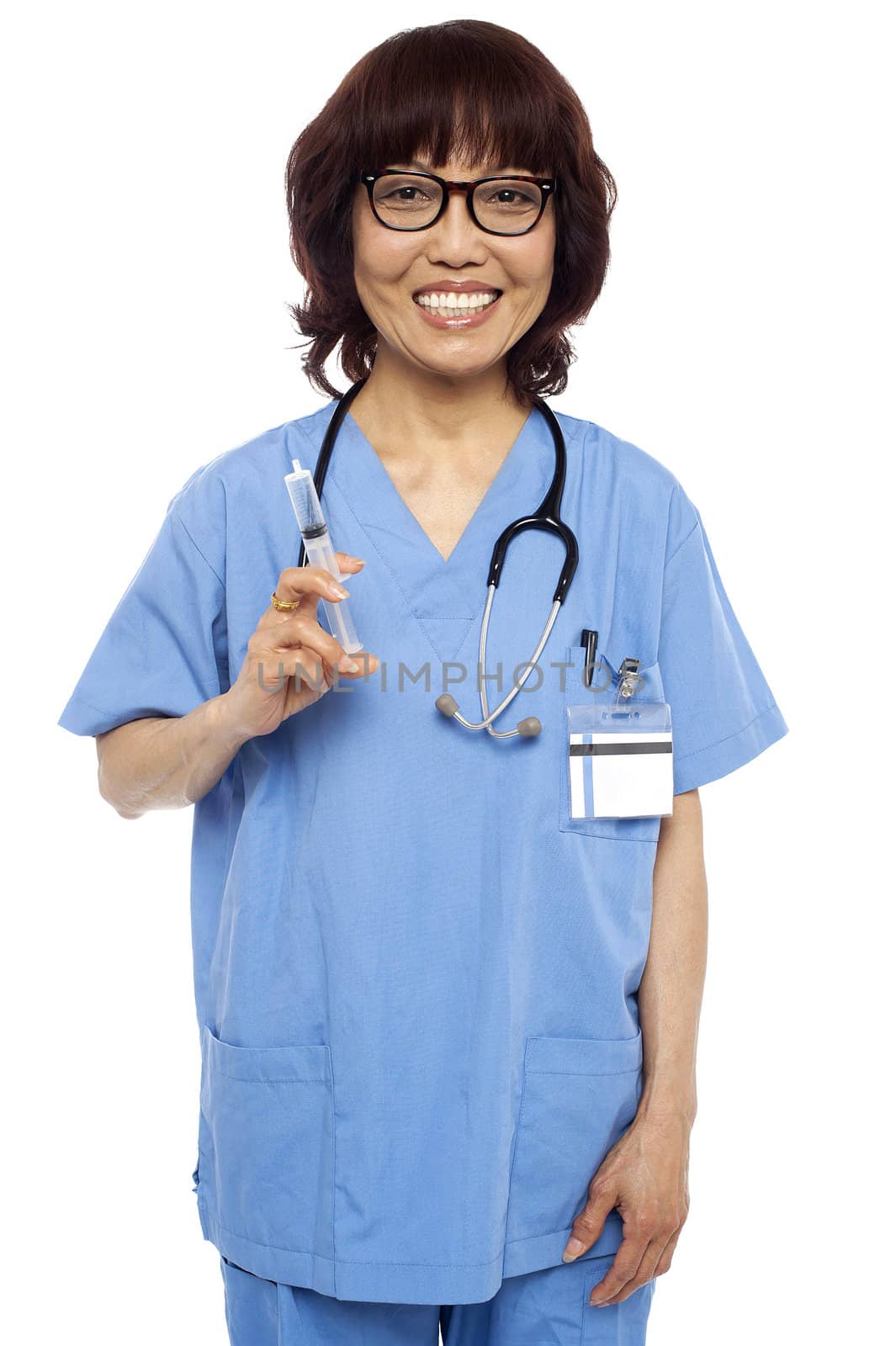 Experienced female pediatrician ready with a syringe. Isolated on white