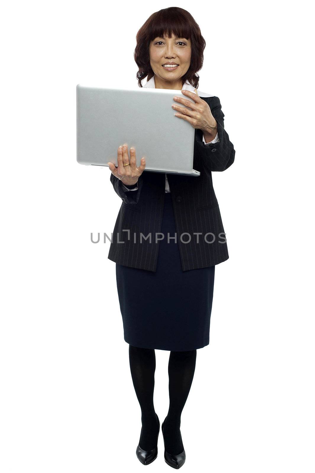 Full length portrait of business representative holding laptop