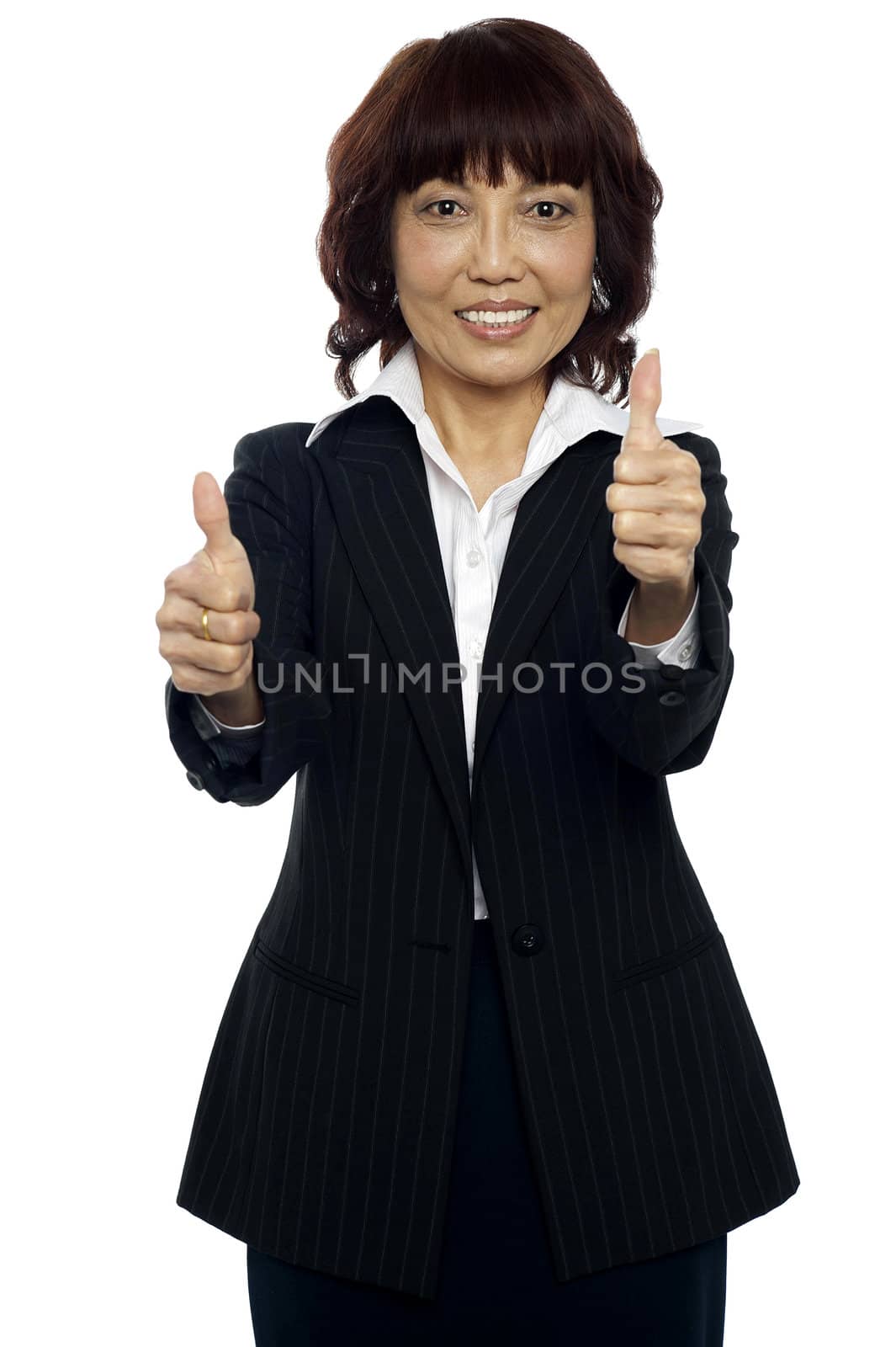 Satisfied asian businesswoman showing double thumbs-up to you