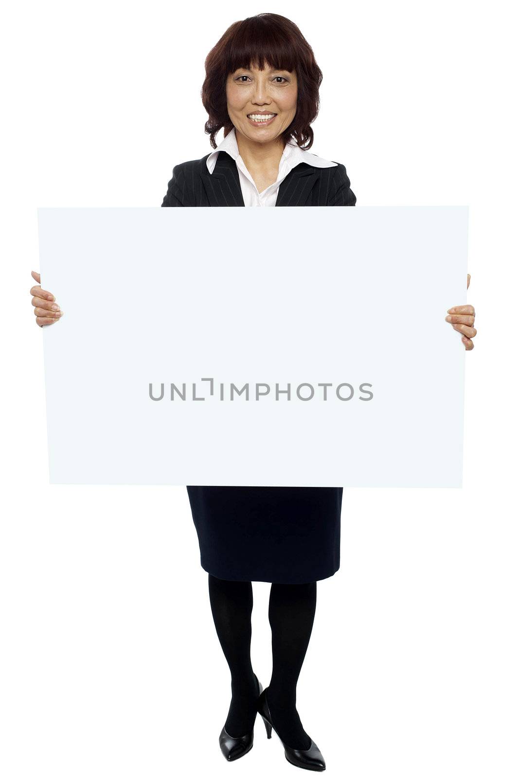 Isolated experienced asian businesswoman holding blank white billboard