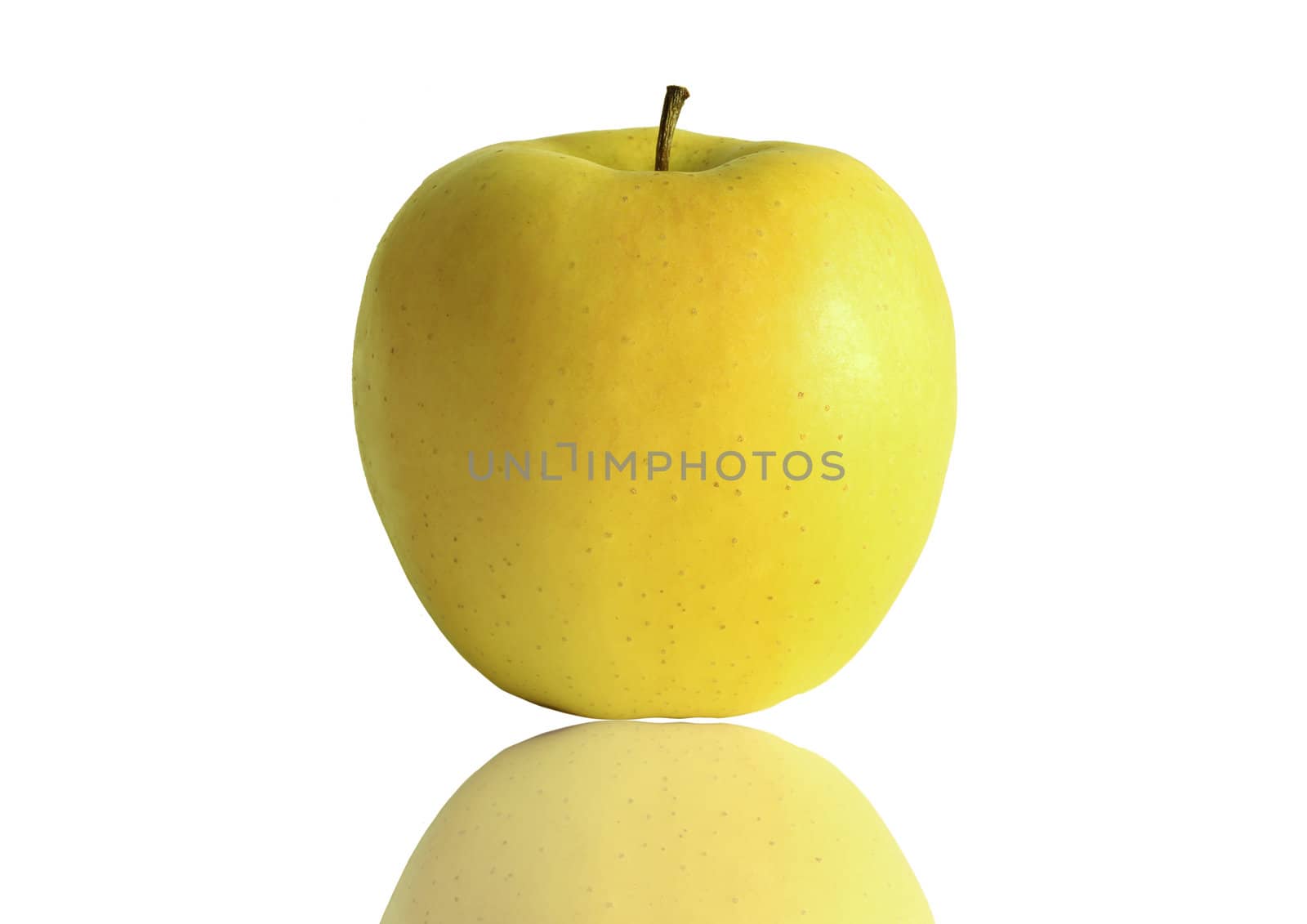One fresh yellow apple on white background