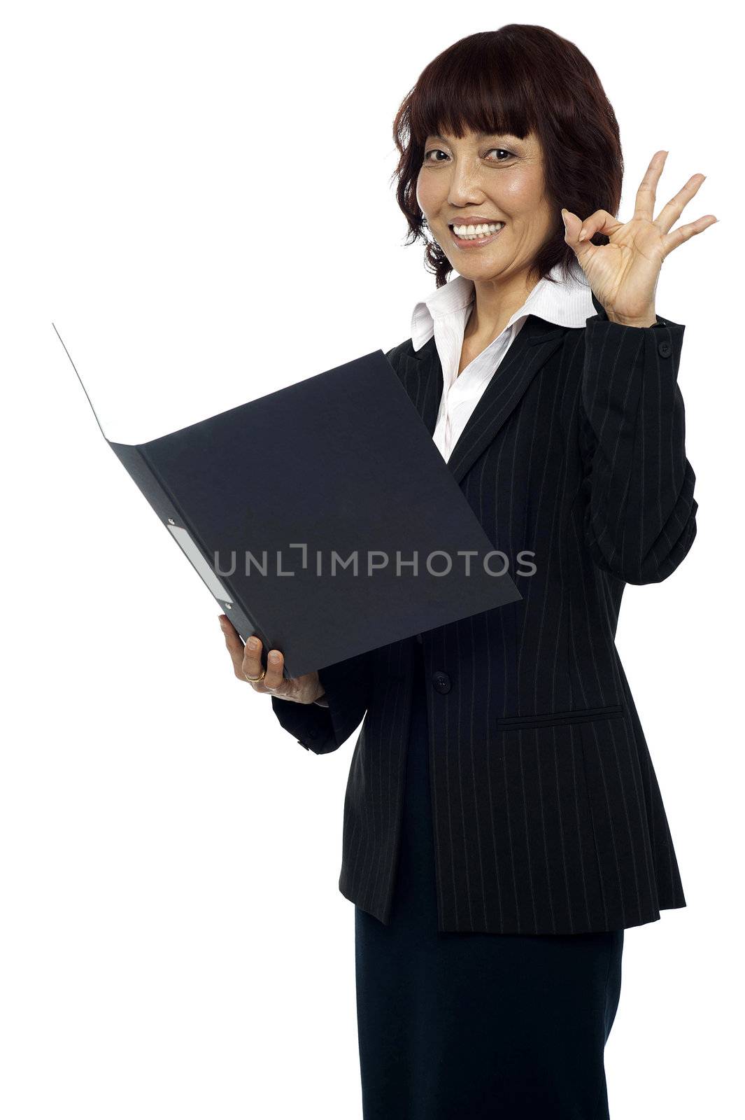 Lady consultant satisfied with the report, gesturing okay sign